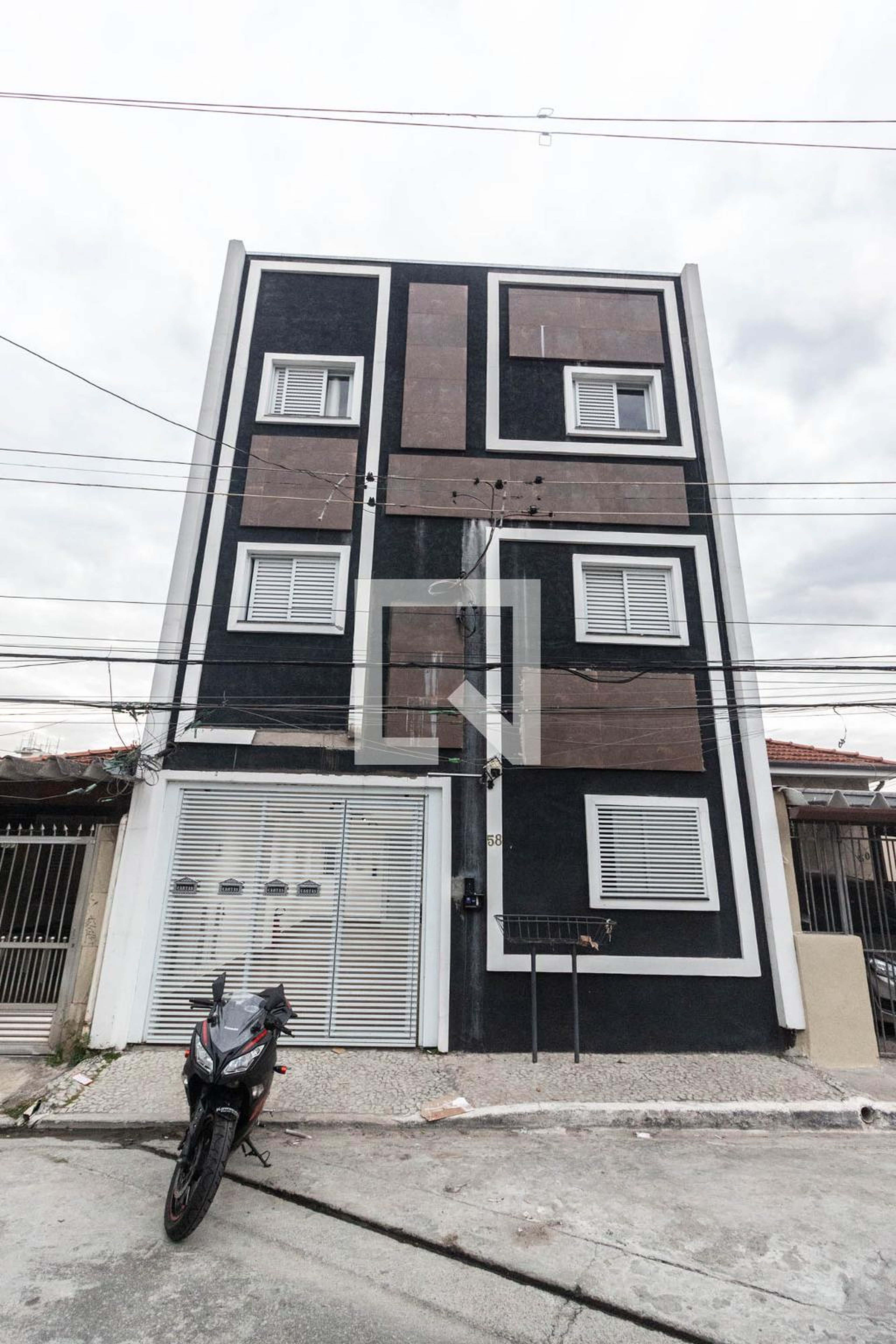 Fachada Condomínio em Rua Andaçu, 58