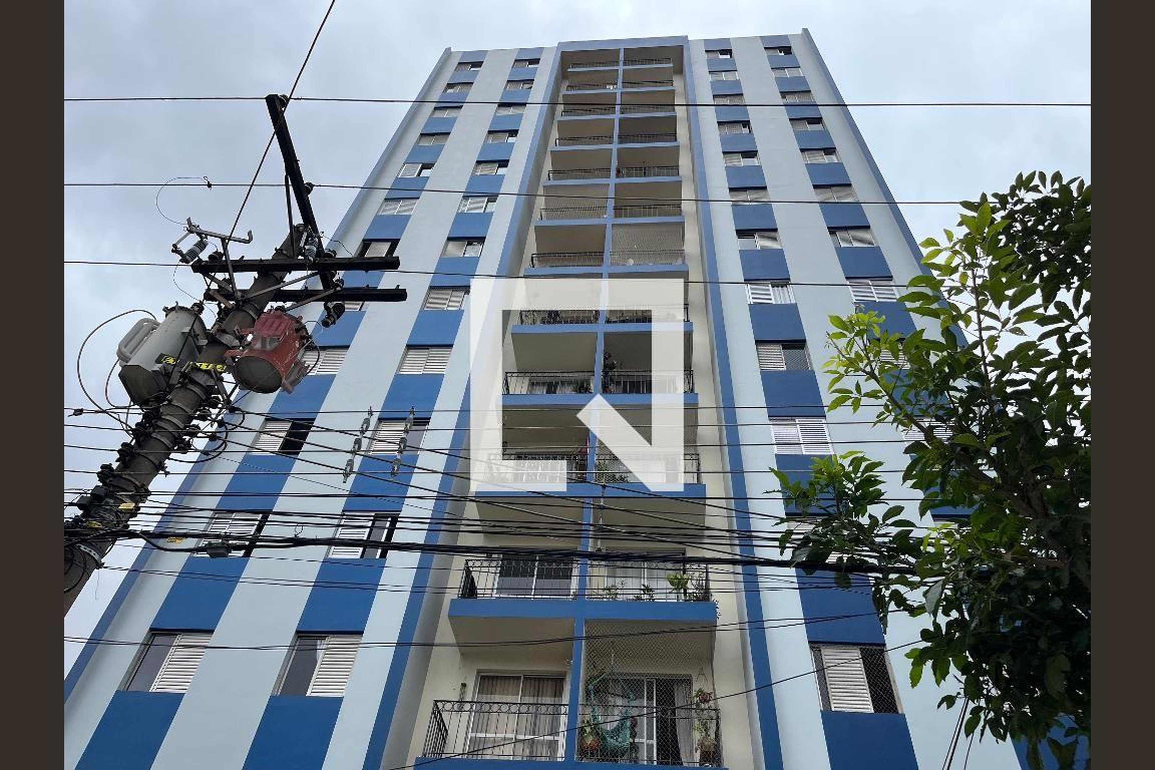 Fachada Condomínio em Rua Ararapira, 292