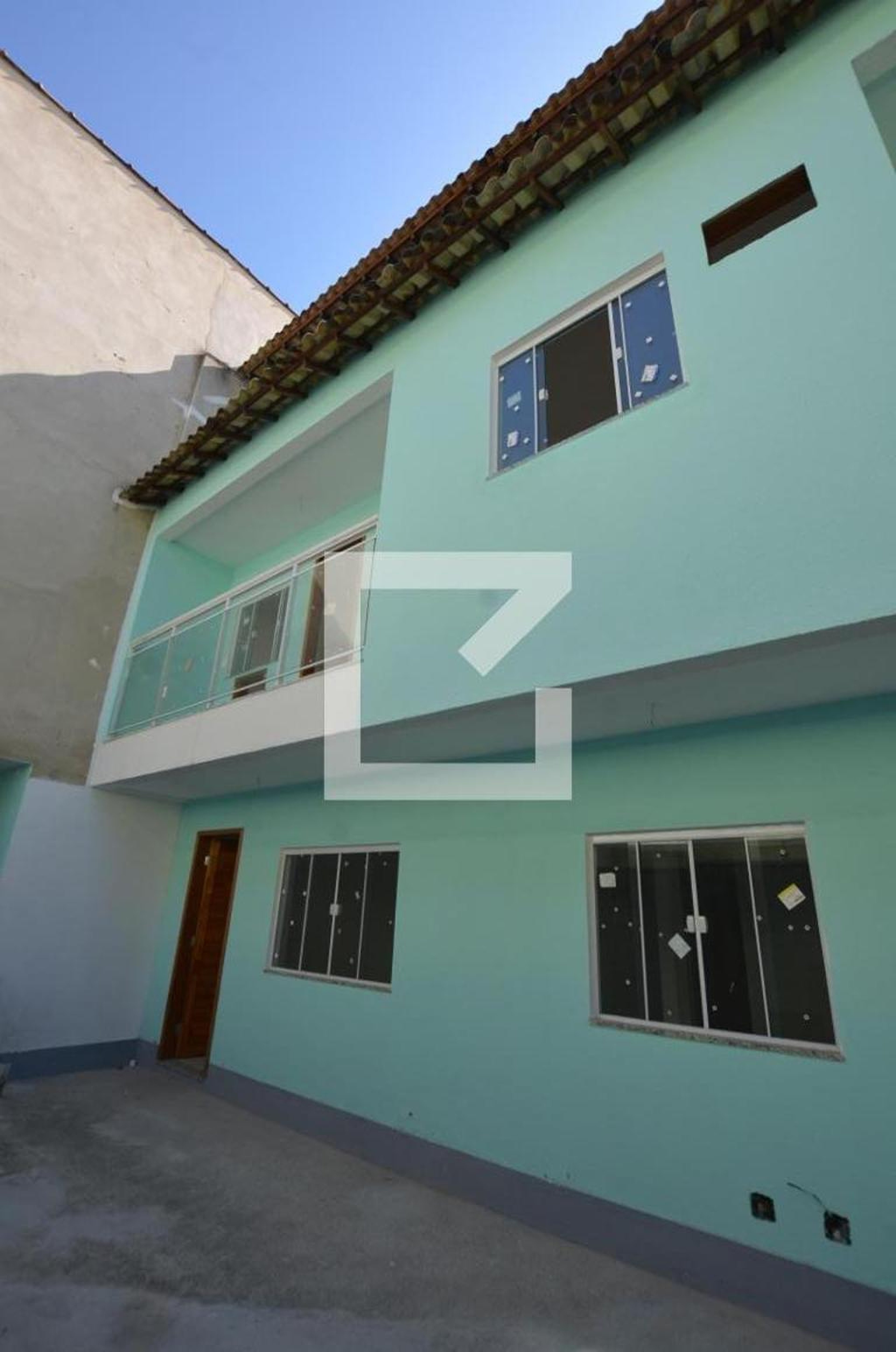 Fachada Condomínio em Rua Alves do Vale, 165