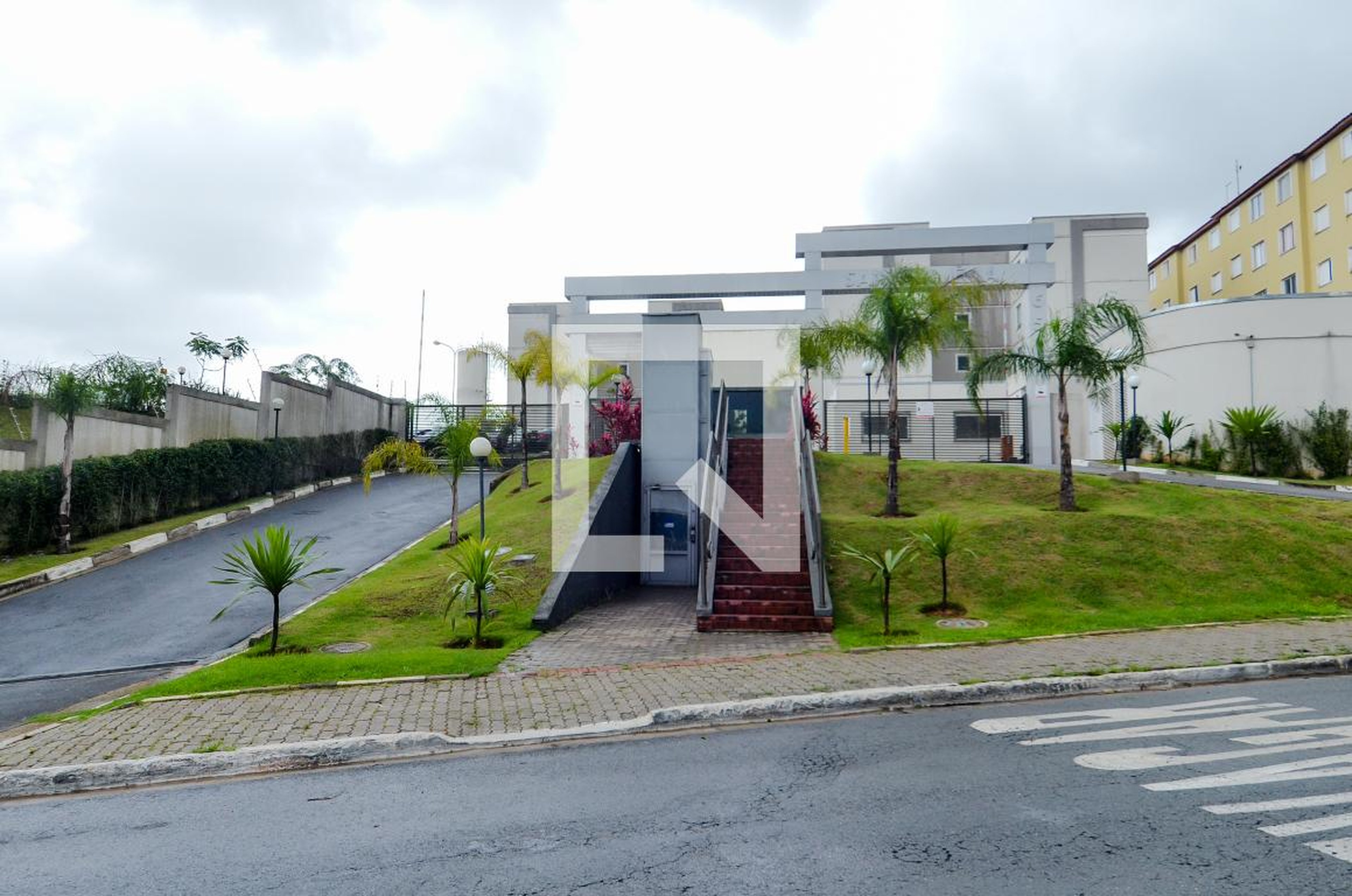 Fachada do Condomínio Condomínio Santa Amélia