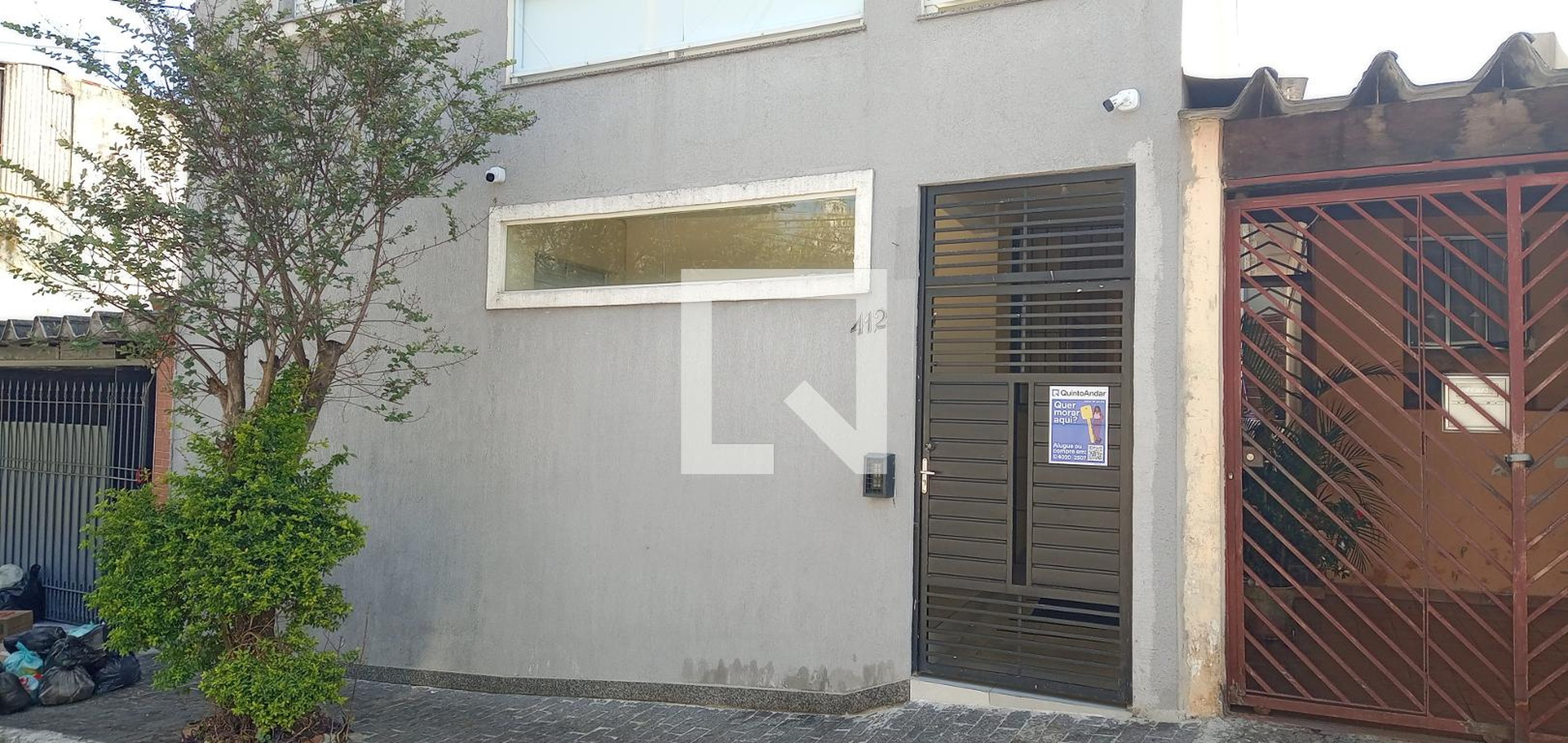 Fachada Condomínio em Rua Faria Lobato, 412