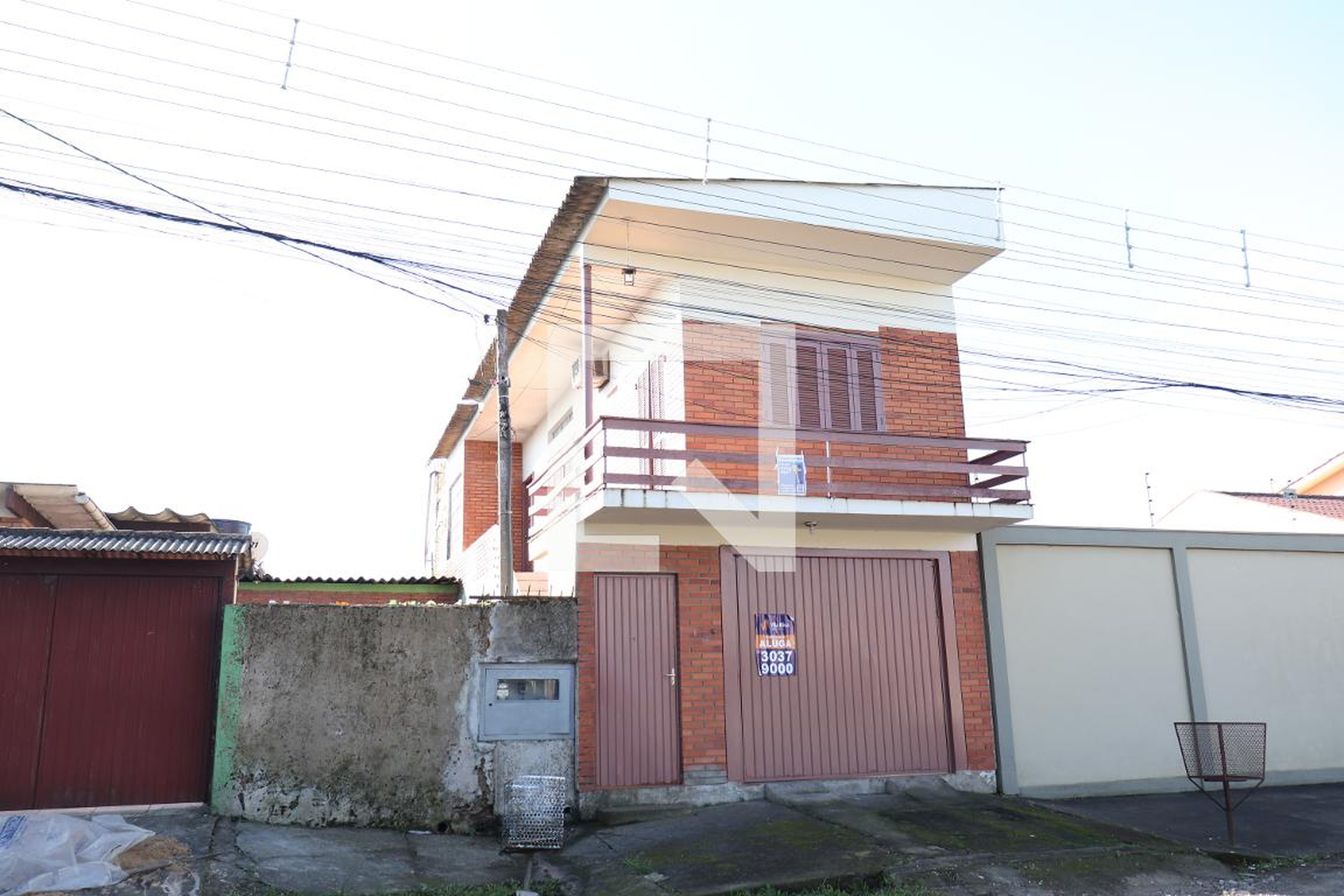 Fachada Condomínio em Rua Jaime Biz, 406