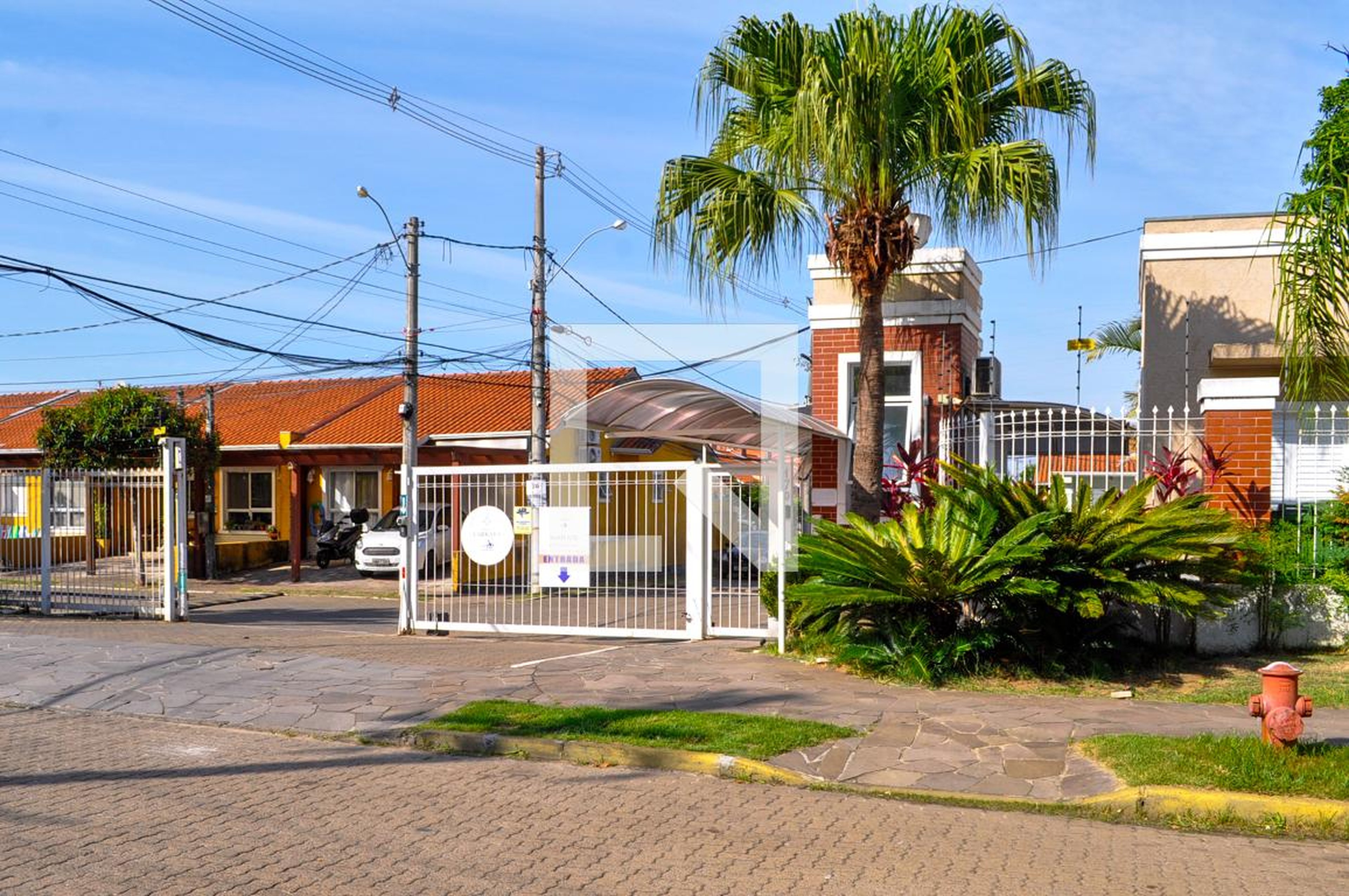 Fachada Condomínio Villa Carrara