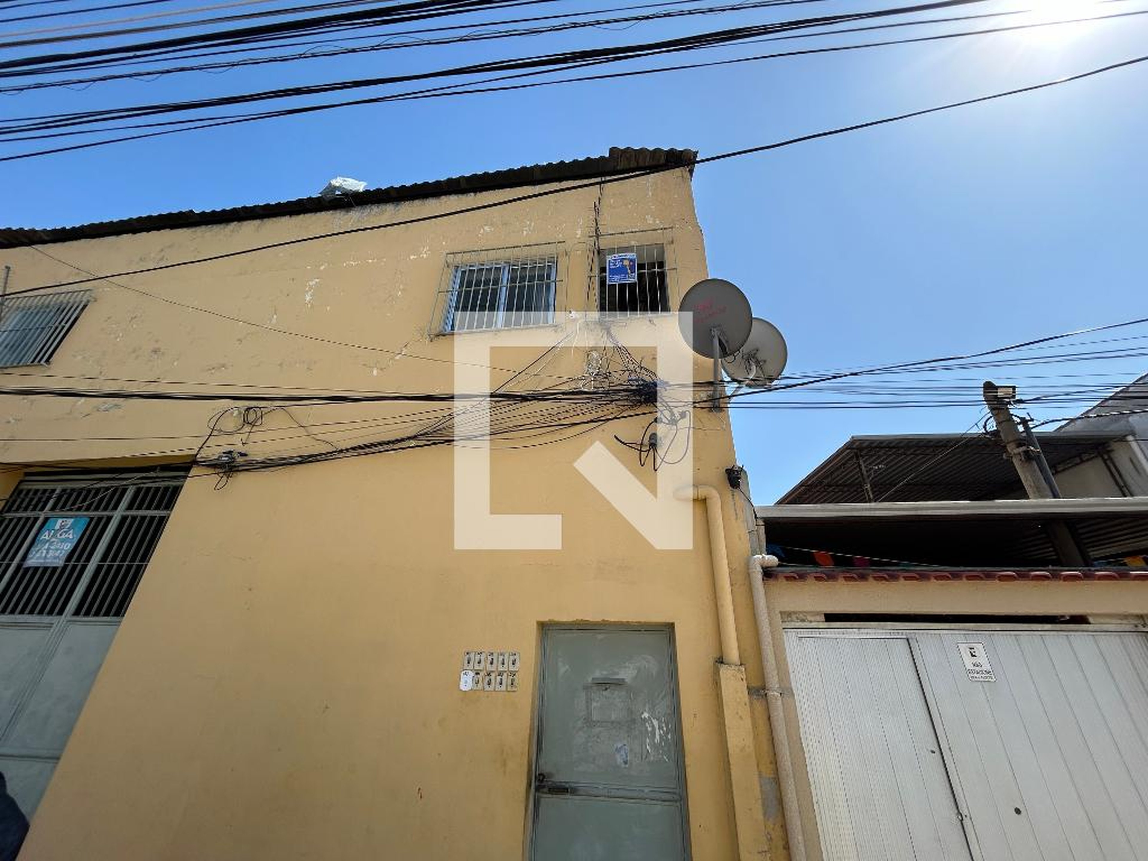 Fachada Condomínio em Rua Oliveira César, 352