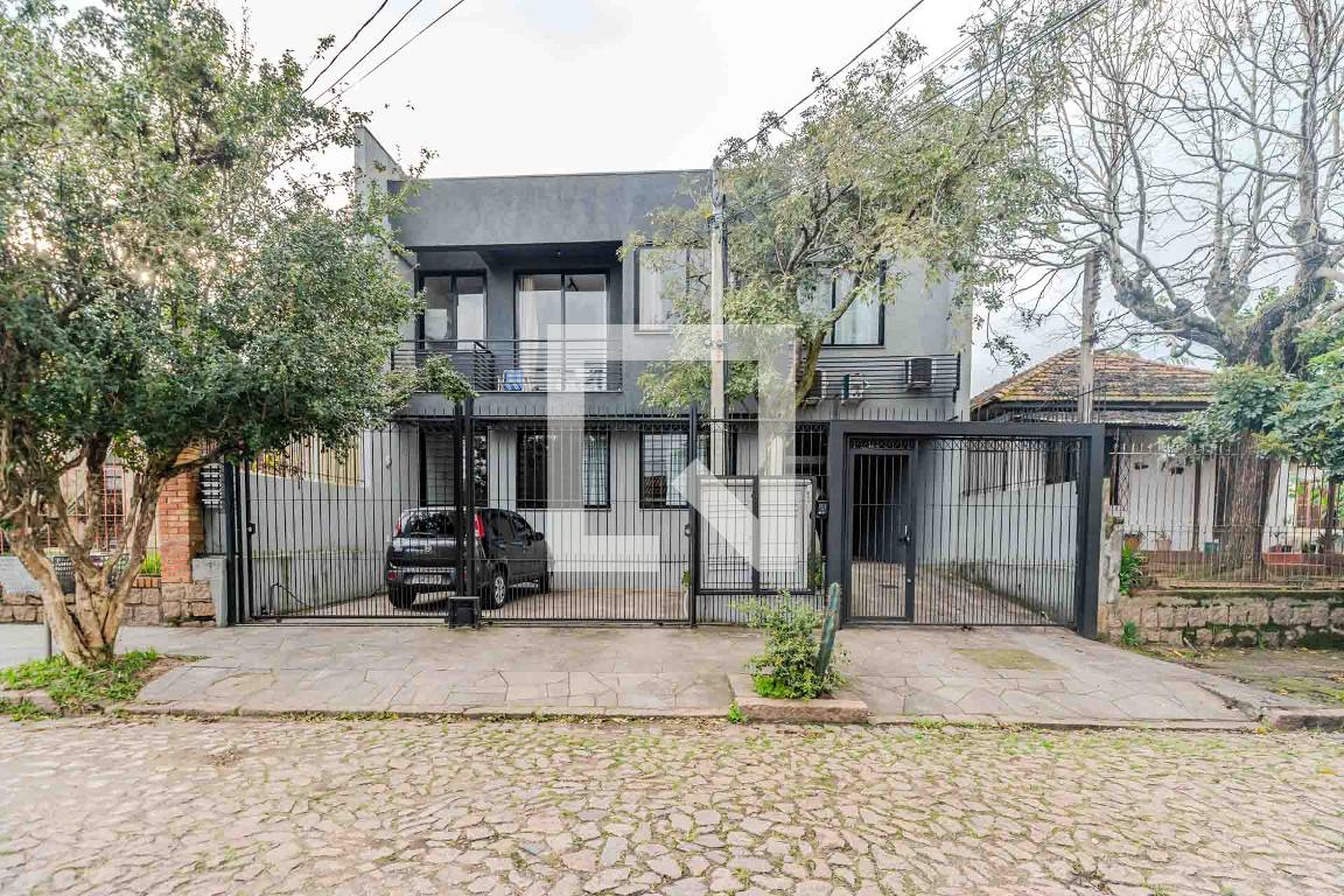 Fachada Condomínio em Rua Dário Cardoso, 90