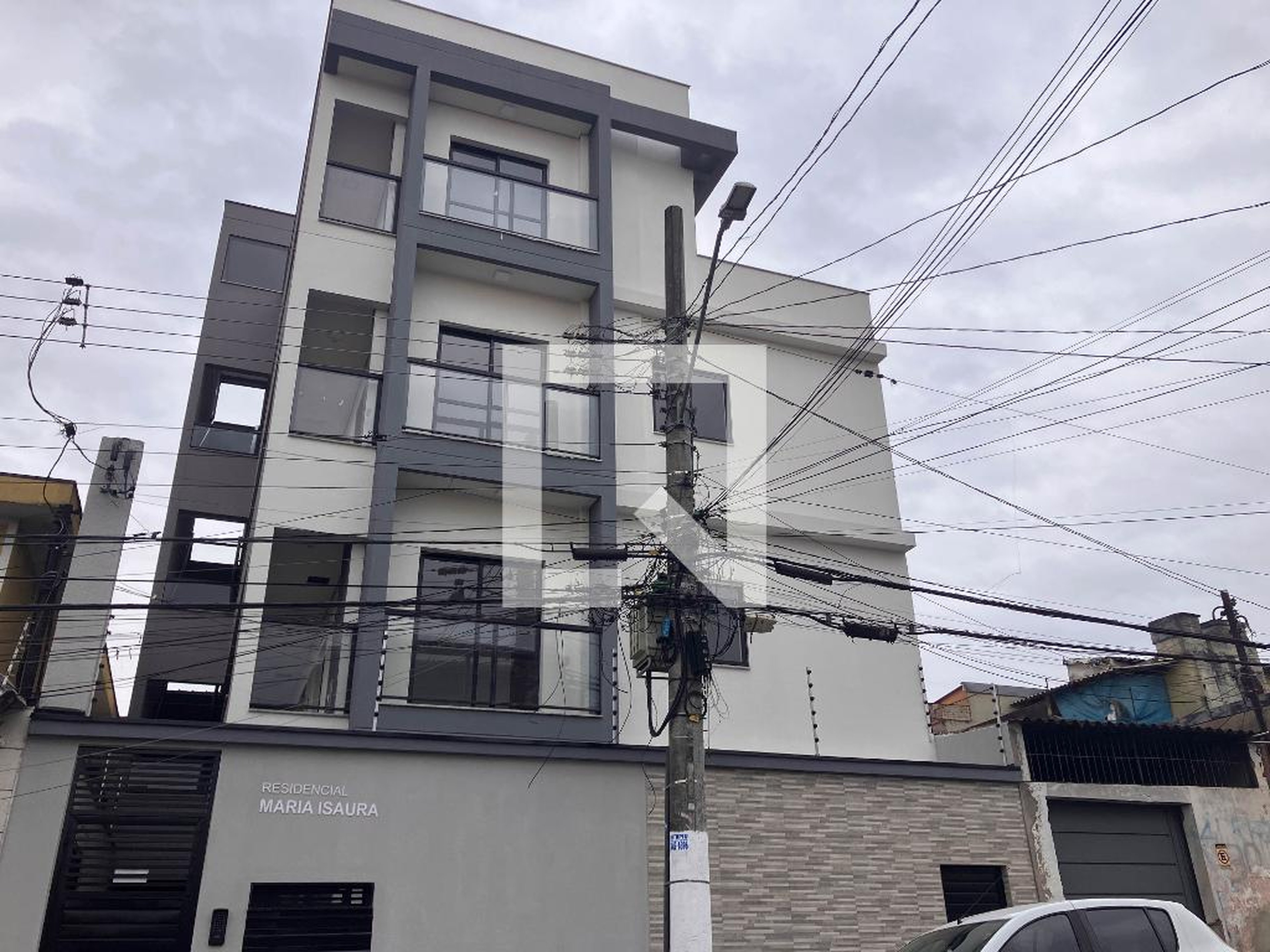 Fachada Condomínio em Rua Heráclito Odilon, 40