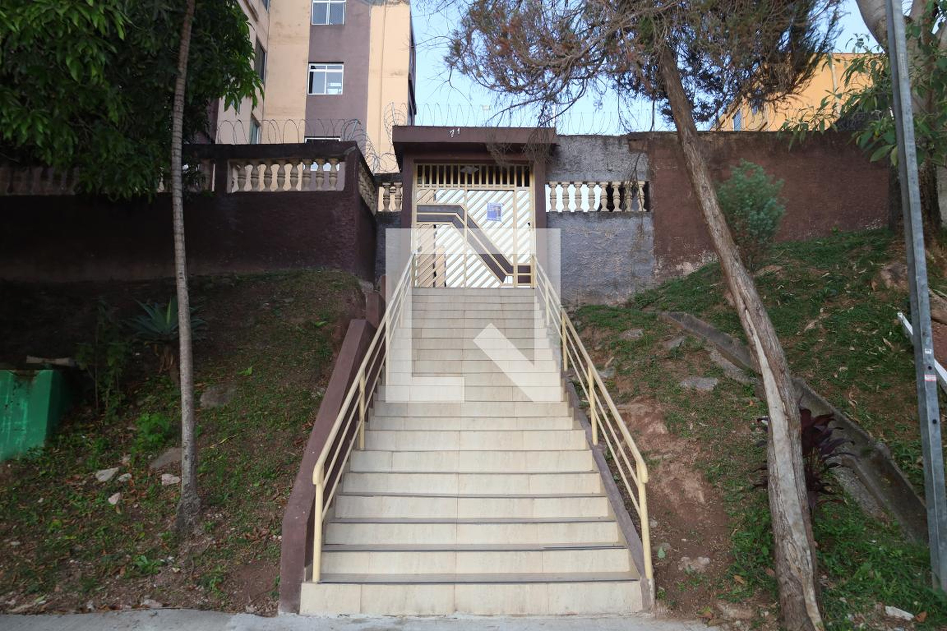 Fachada Condomínio em Rua Gavião Pescador, 7