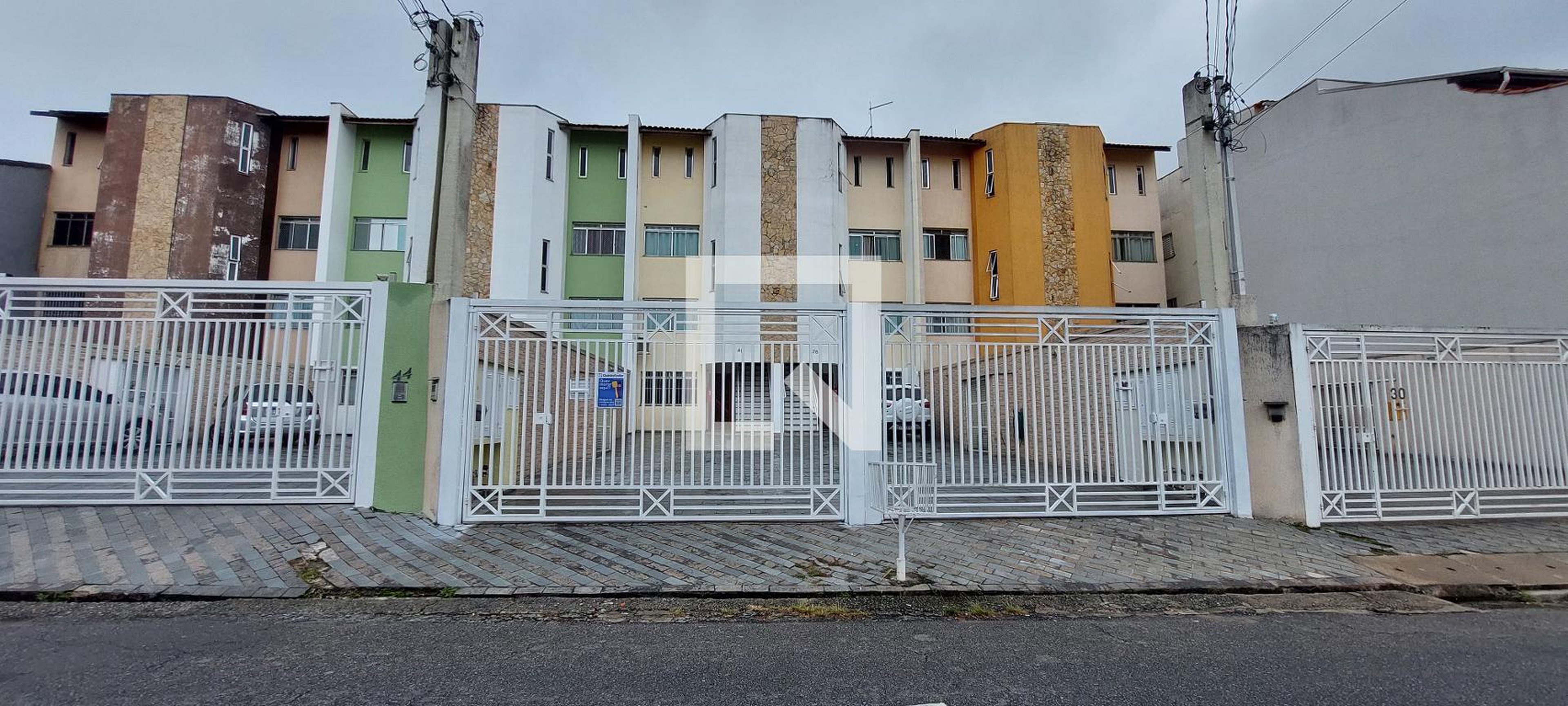 Fachada Condomínio em Rua Miquelina, 40