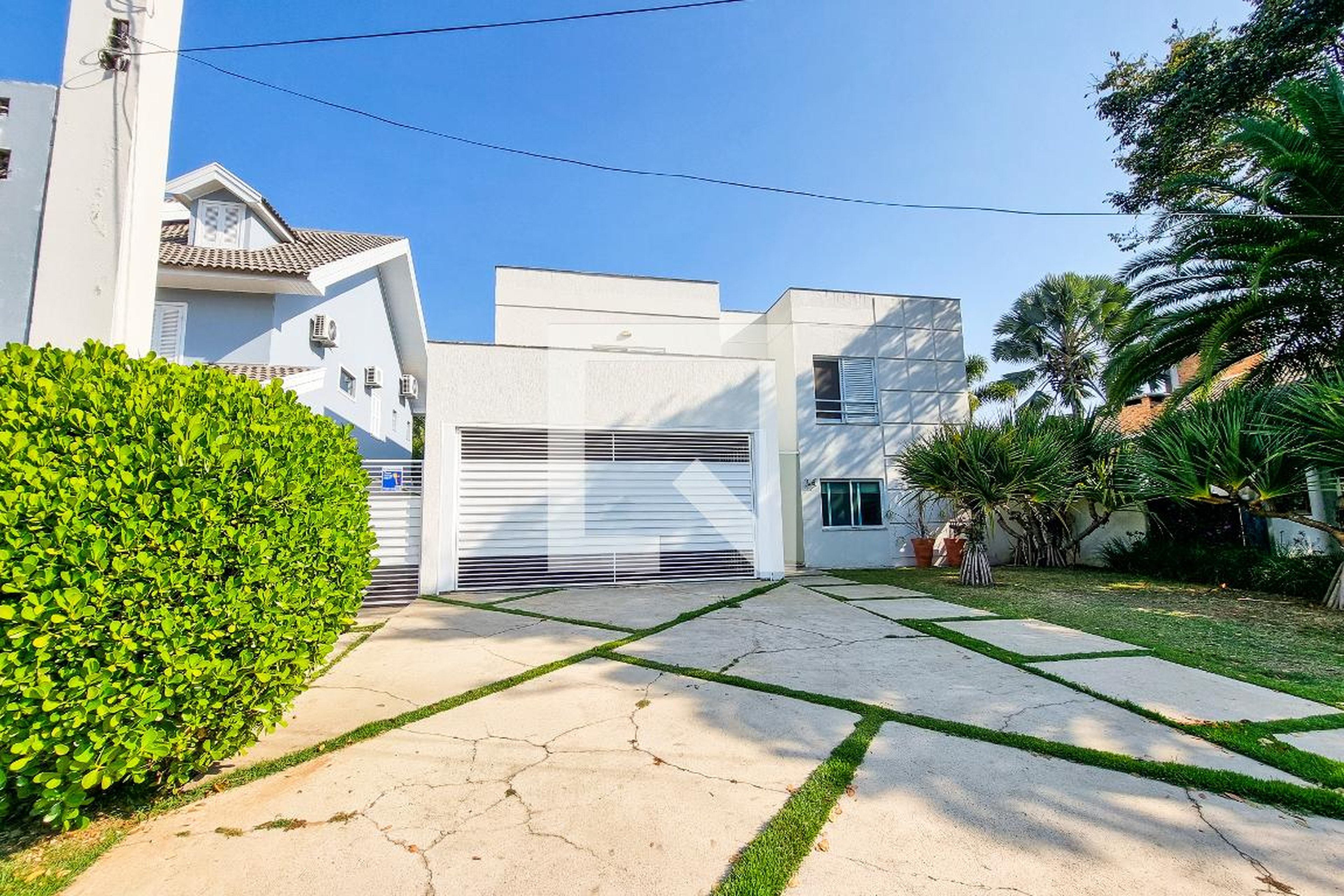 Fachada Condomínio em Rua Guido Zeca, 68