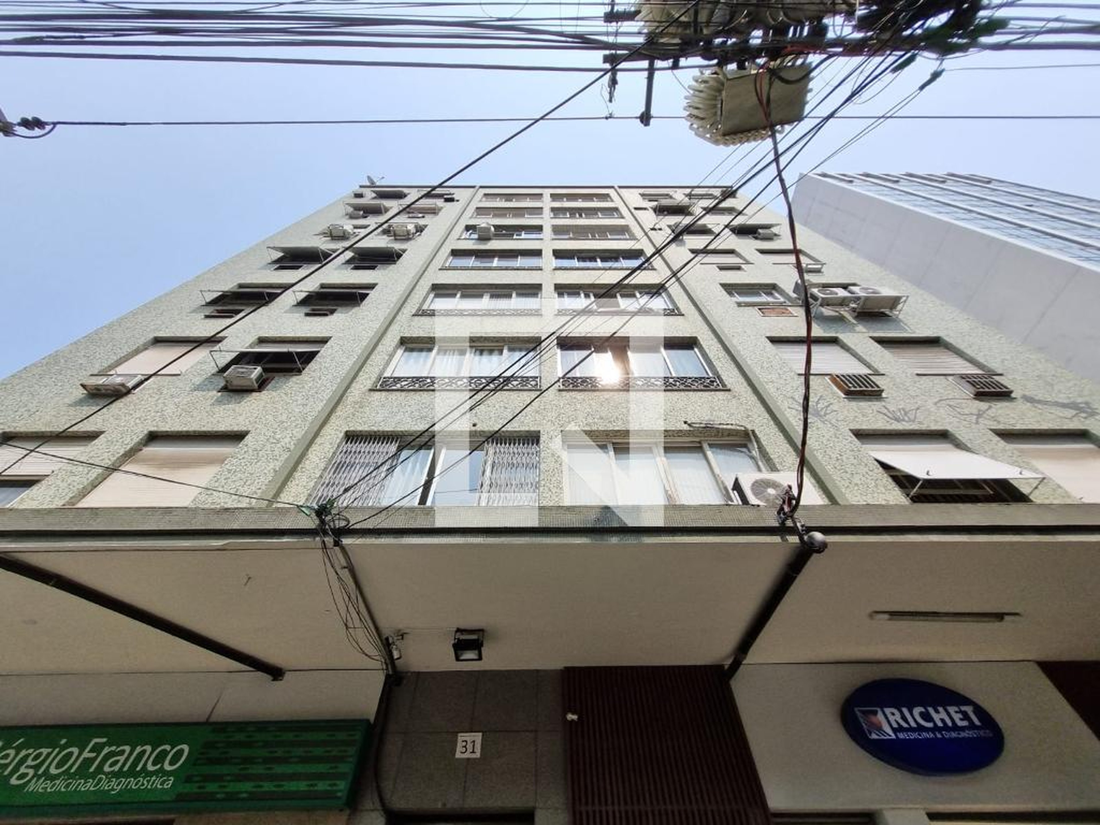 Fachada Condomínio em Rua Pinto de Figueiredo, 130