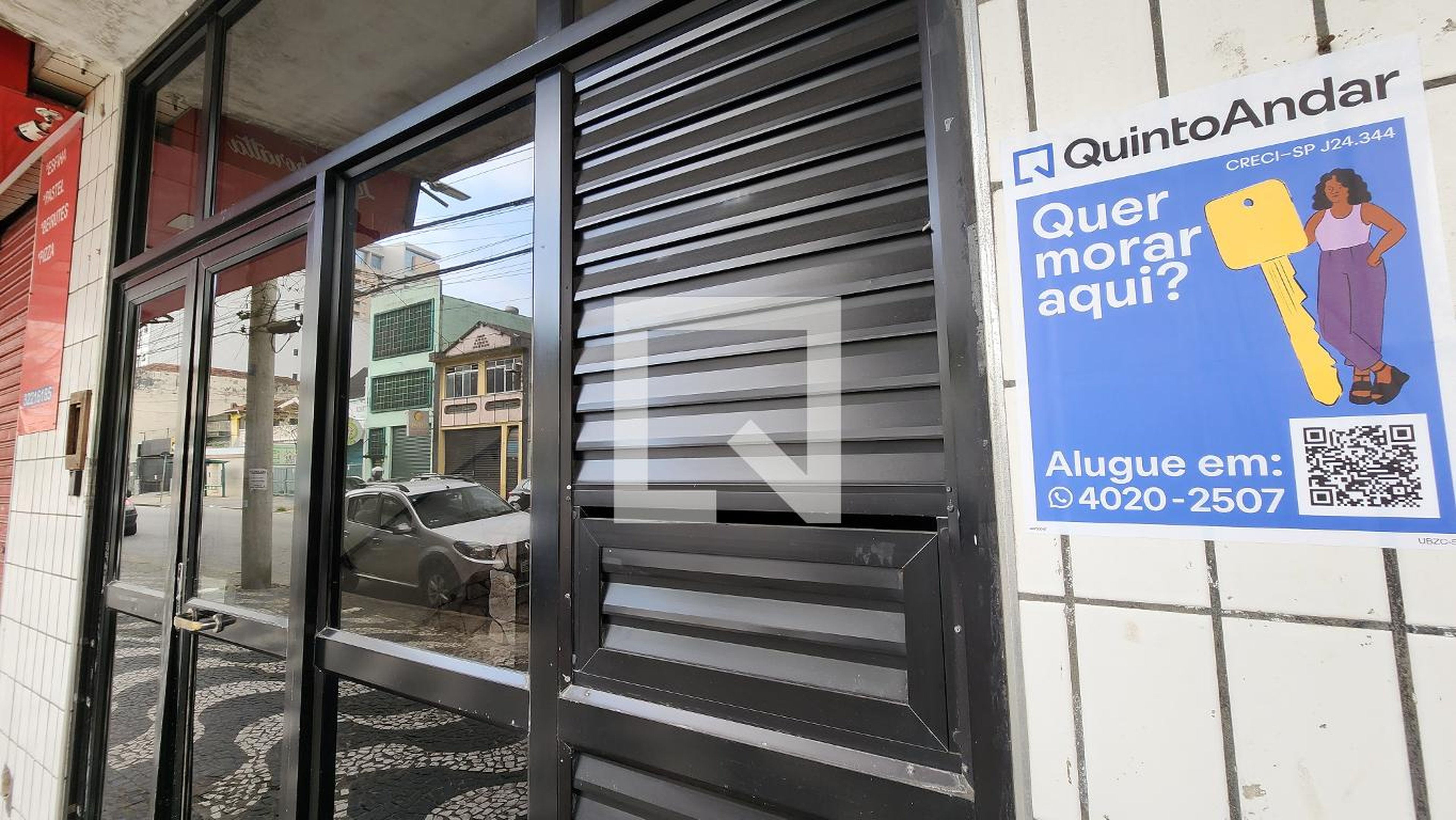 Fachada Condomínio em Rua Carvalho de Mendonça, 66