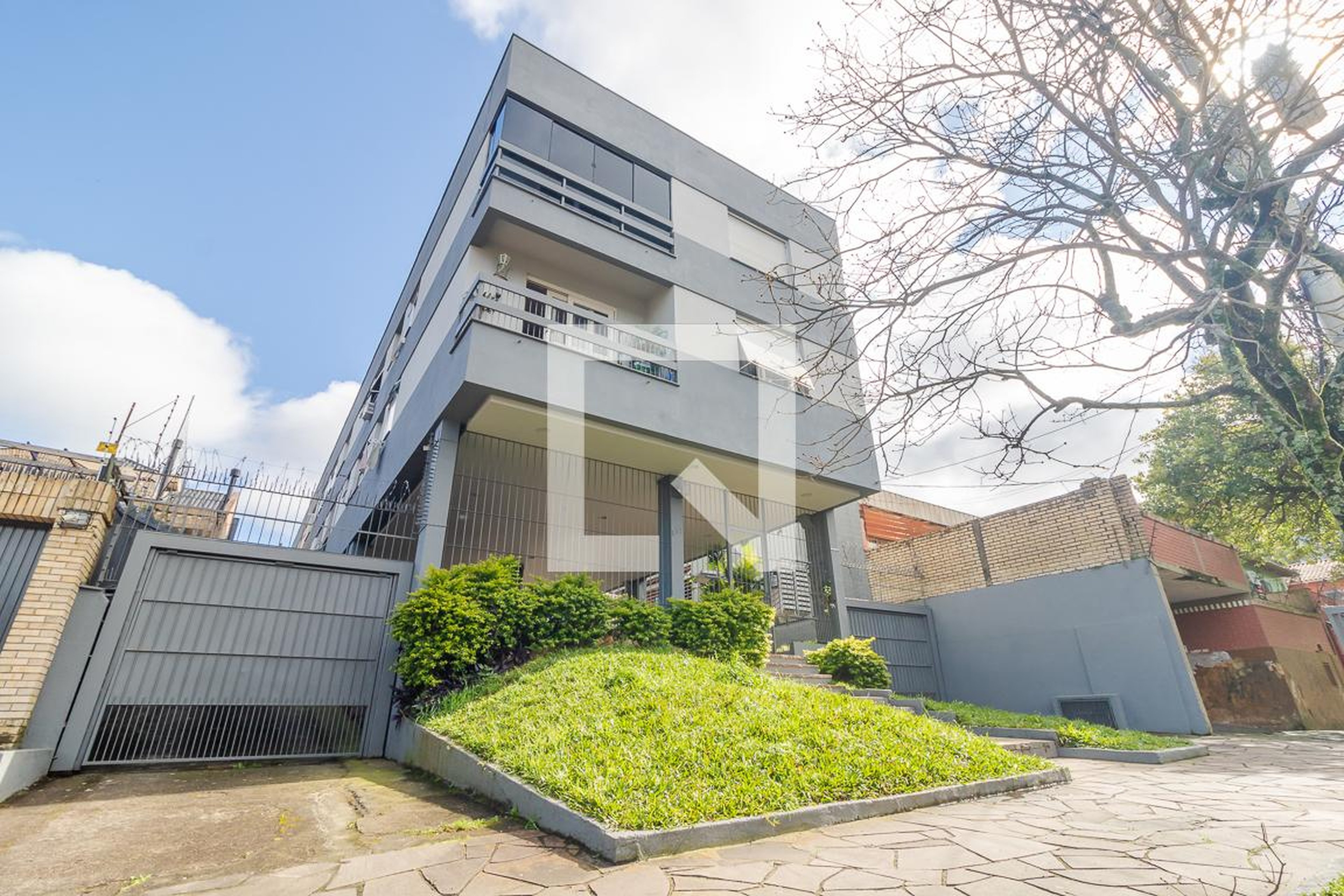 Fachada Condomínio em Rua Dário Totta, 397