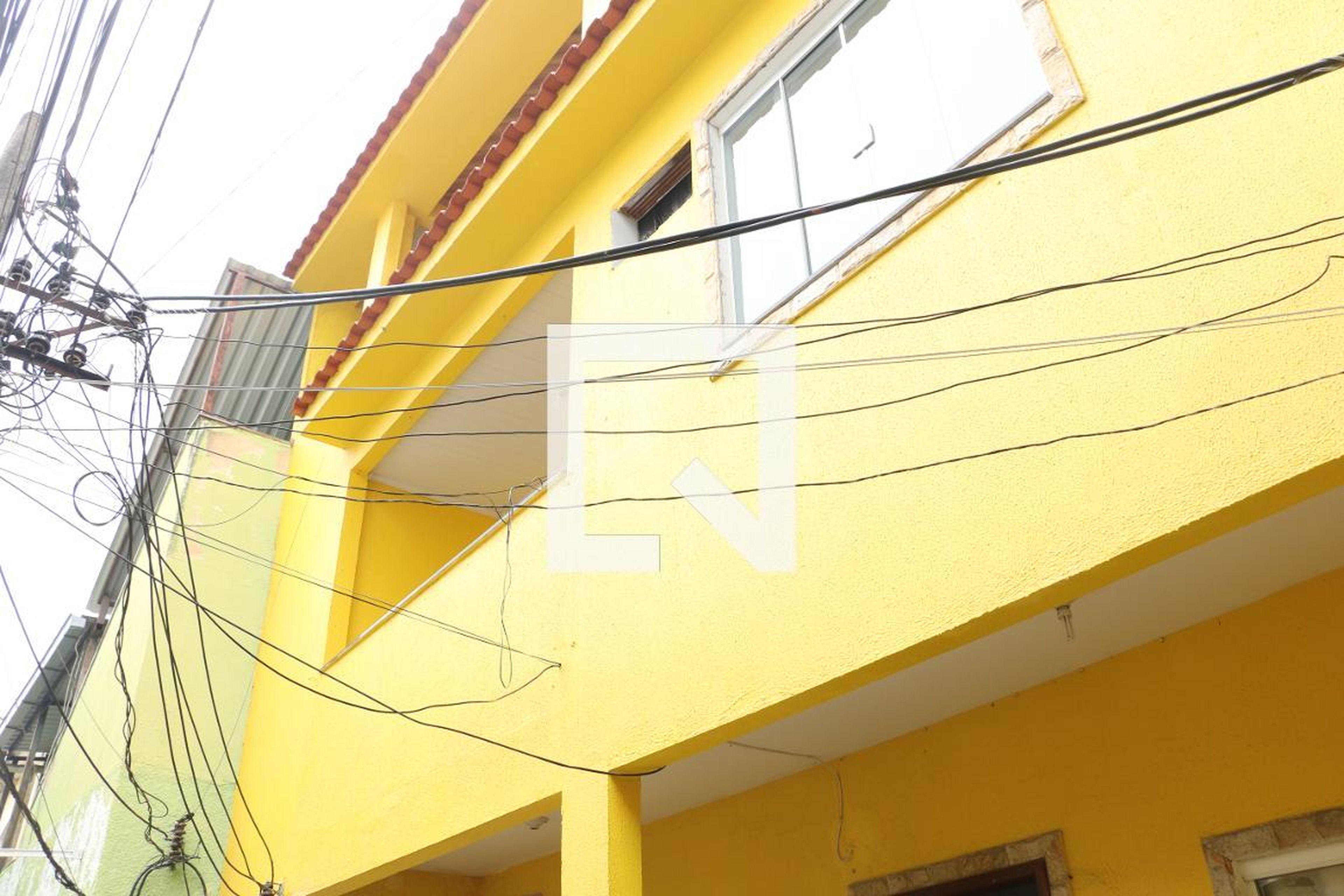 Fachada Condomínio em Rua Luís de Camões, 115