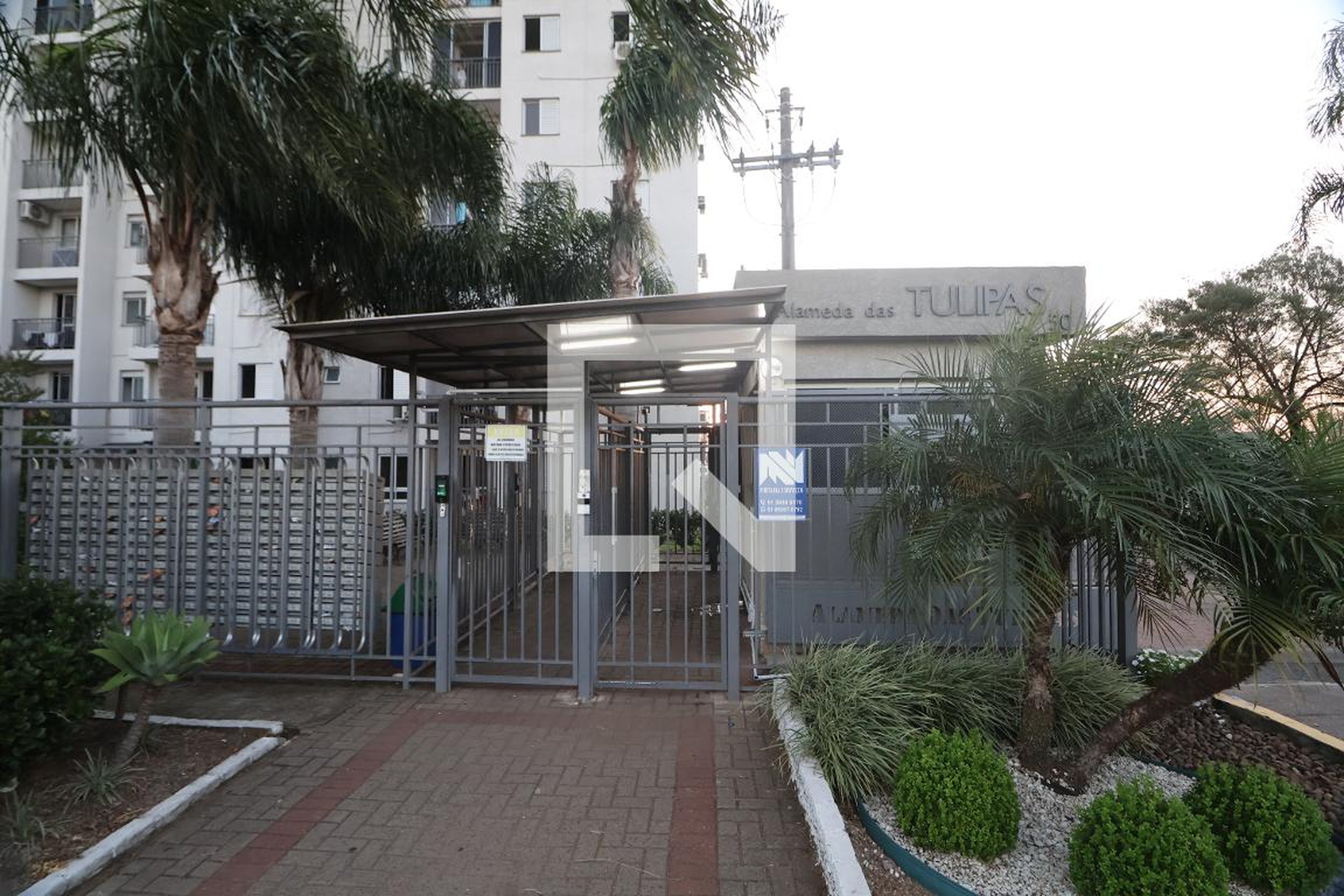 Fachada do Condomínio Condomínio Alameda das Tulipas