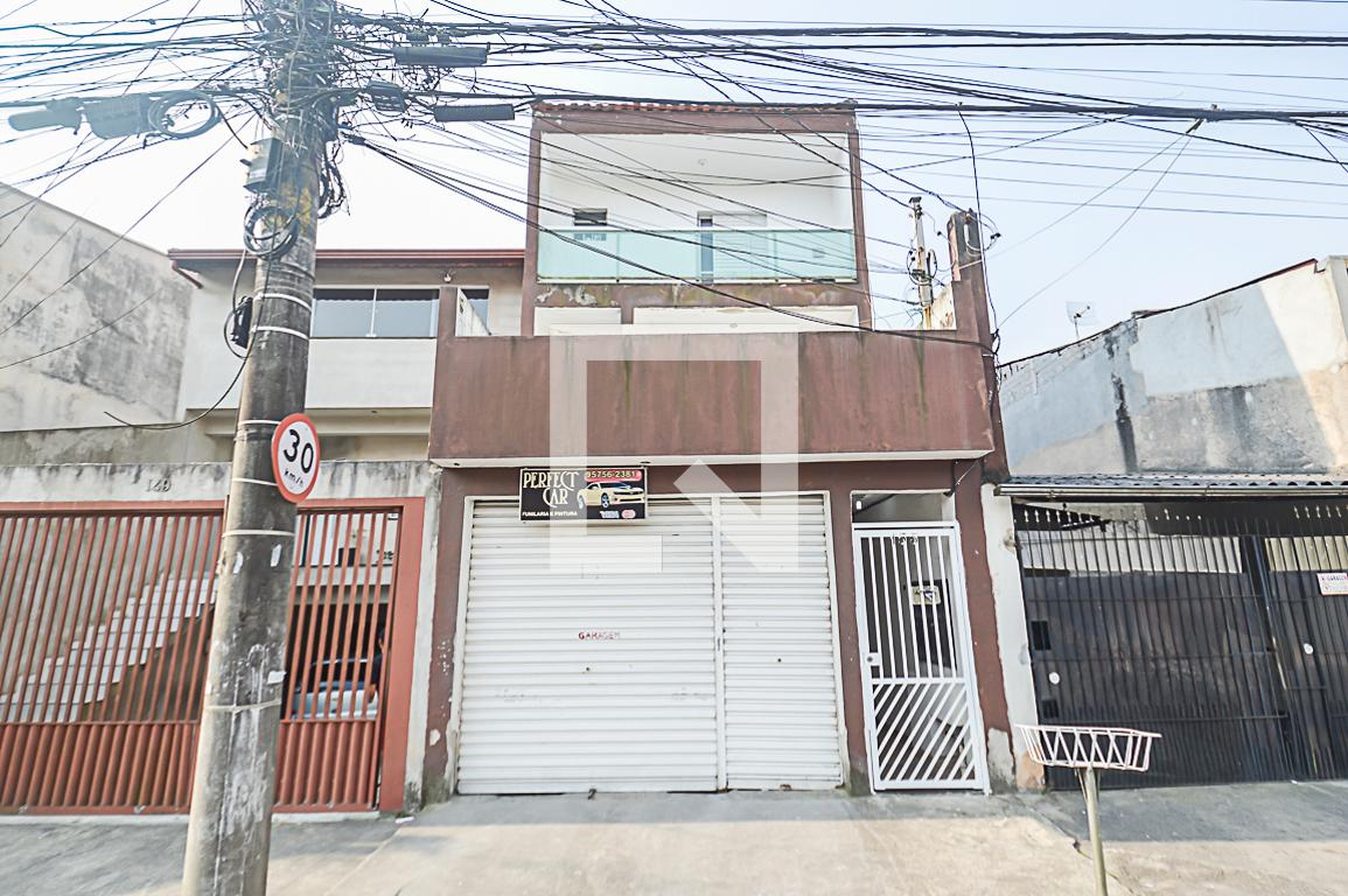 Fachada Condomínio em Rua Osvaldo Stuchi, 153