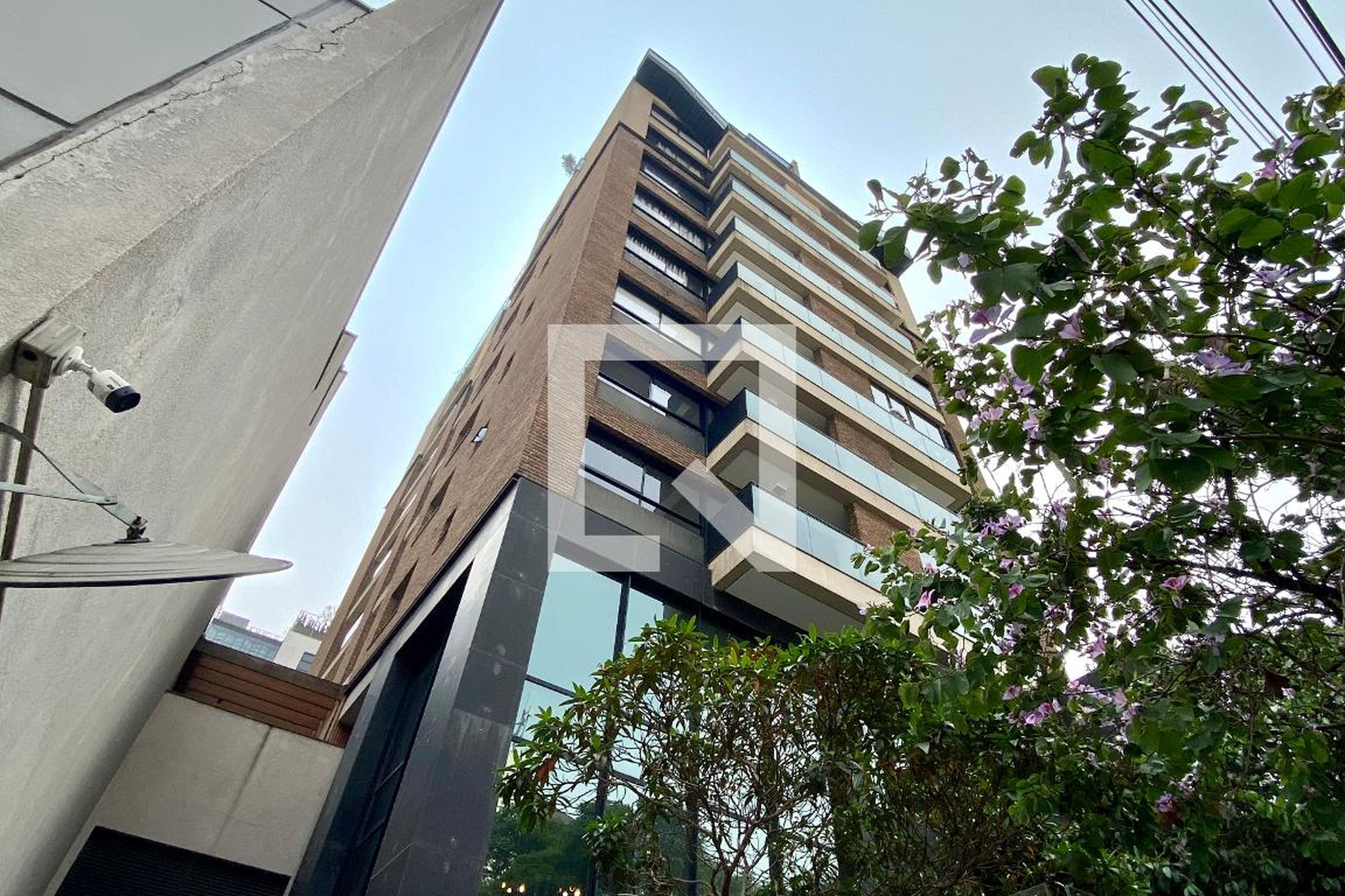 Fachada Condomínio em Rua Purpurina, 86