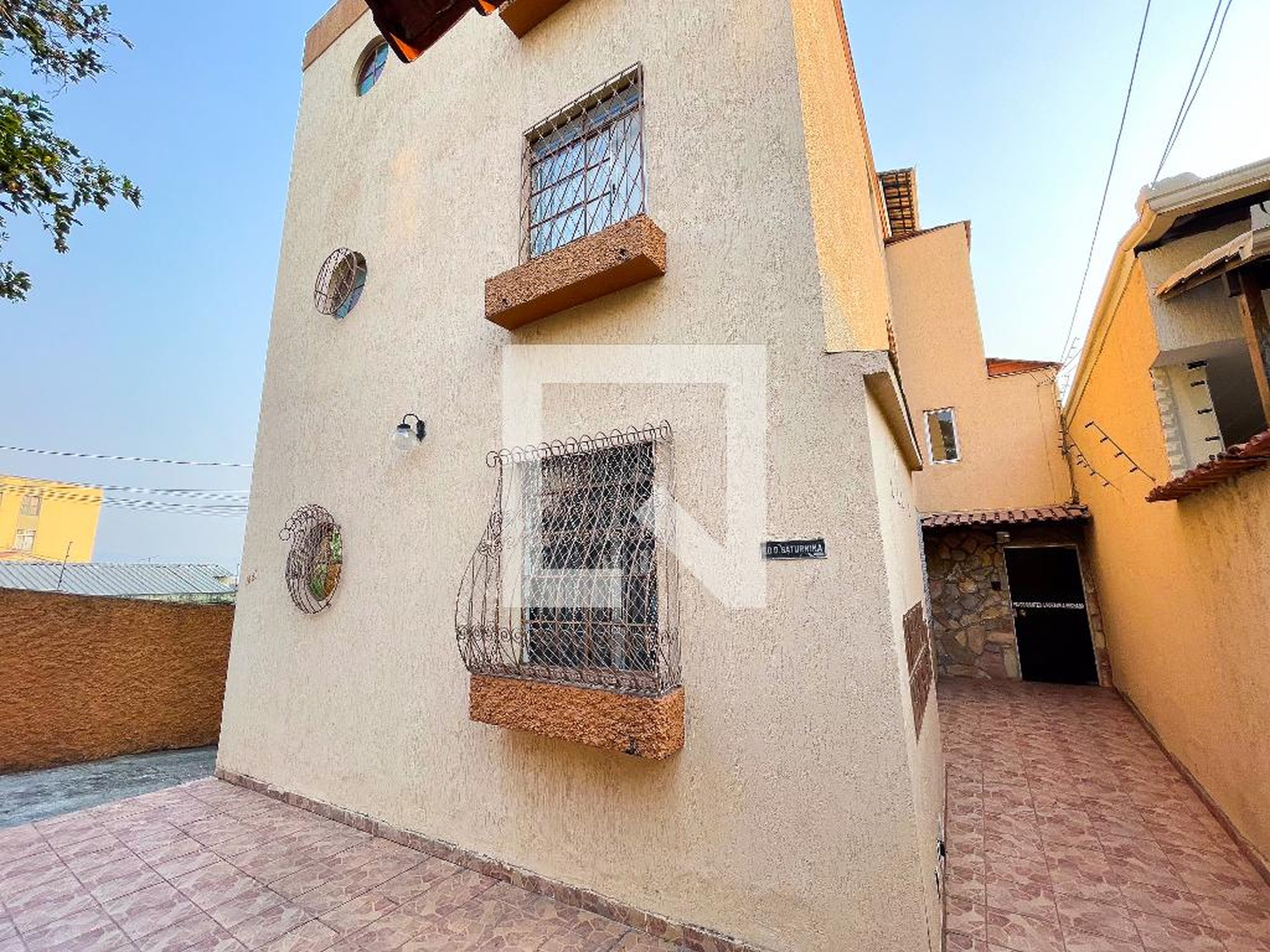 Fachada Condomínio em Rua Buganville, 1441