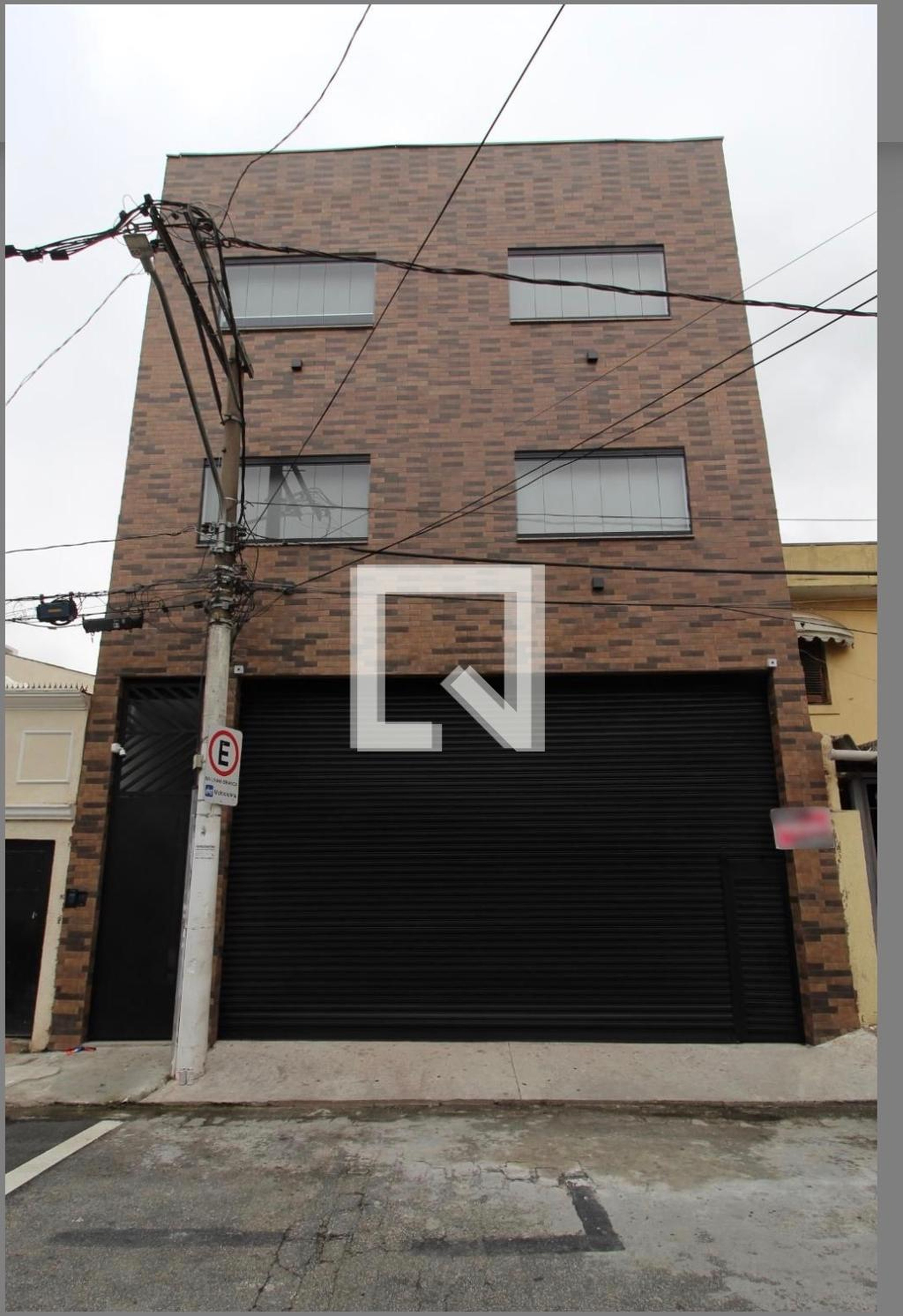 Fachada Condomínio em Rua Apamas, 45