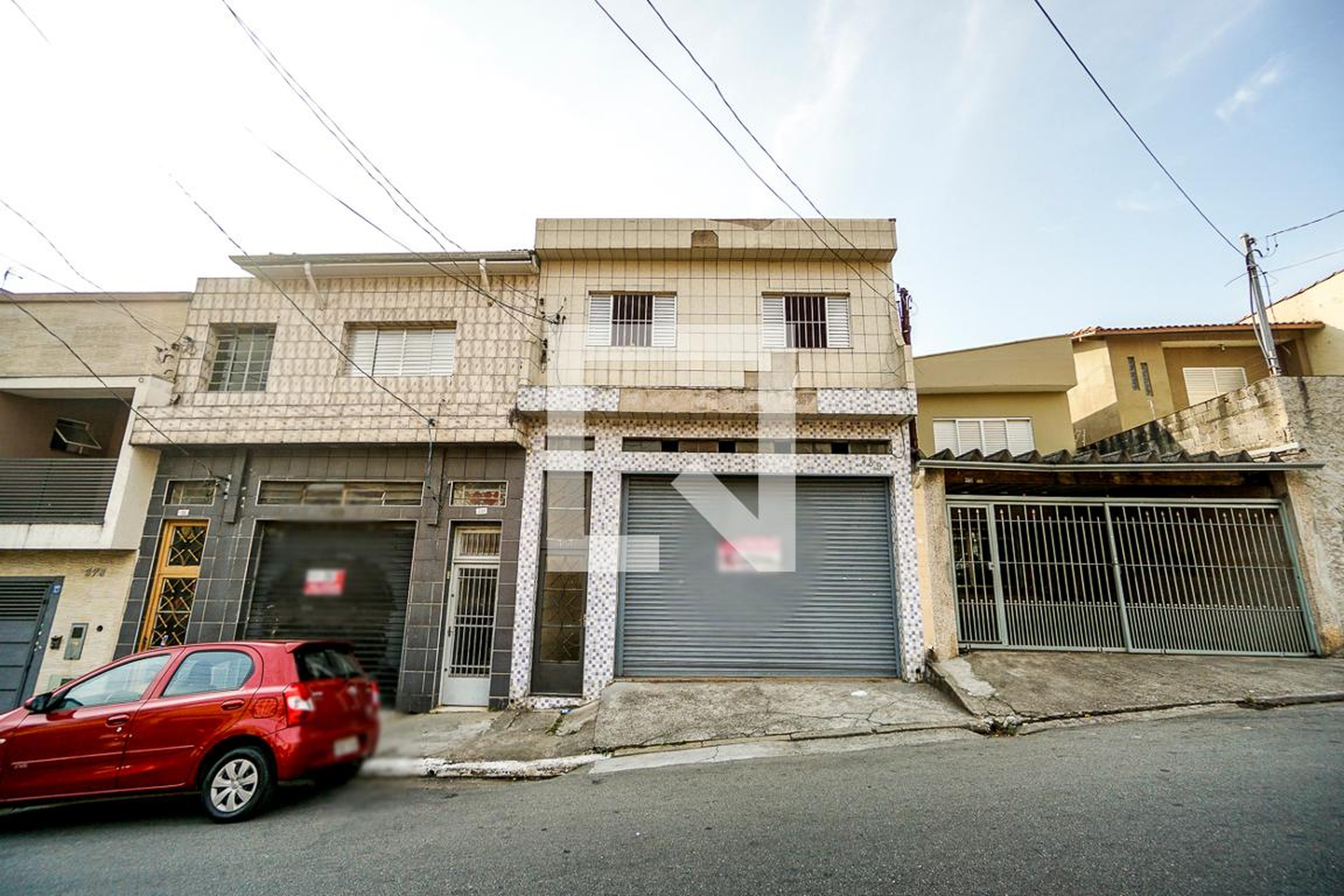 Fachada Condomínio em Rua Caquito, 383