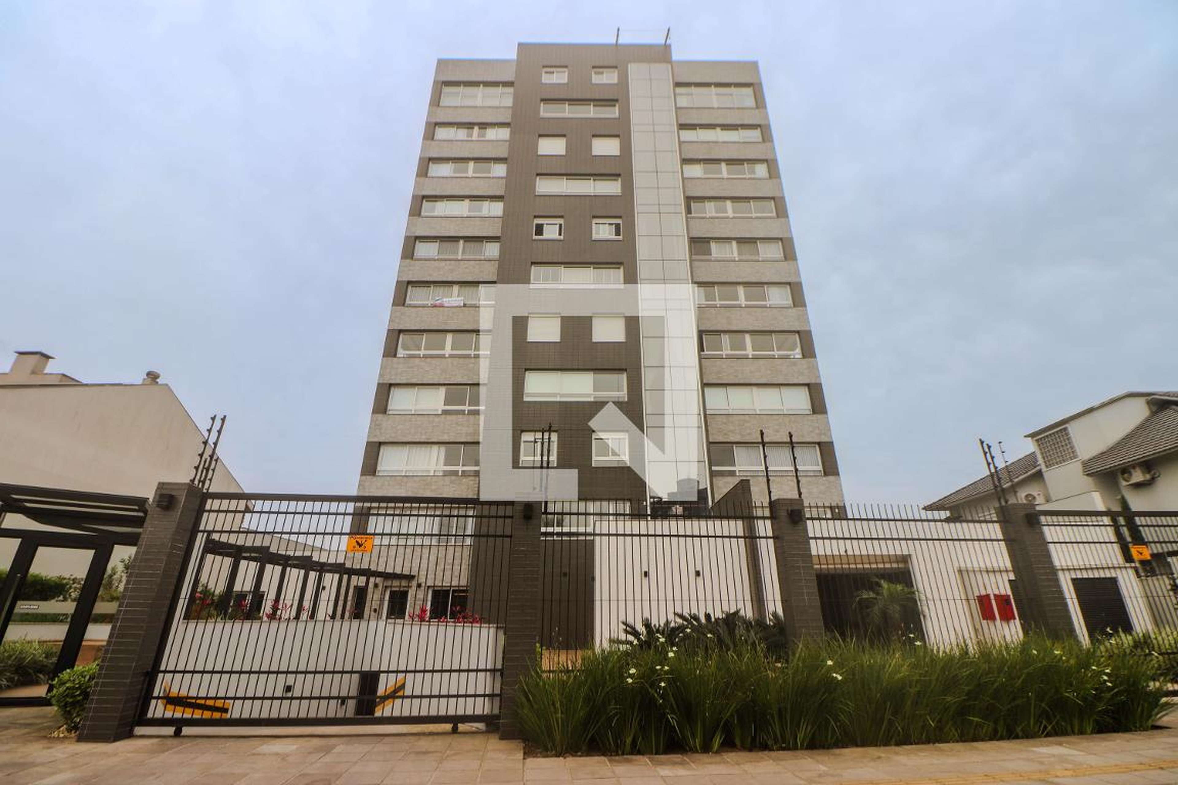 Fachada Condomínio em Rua Walir Zottis, 625