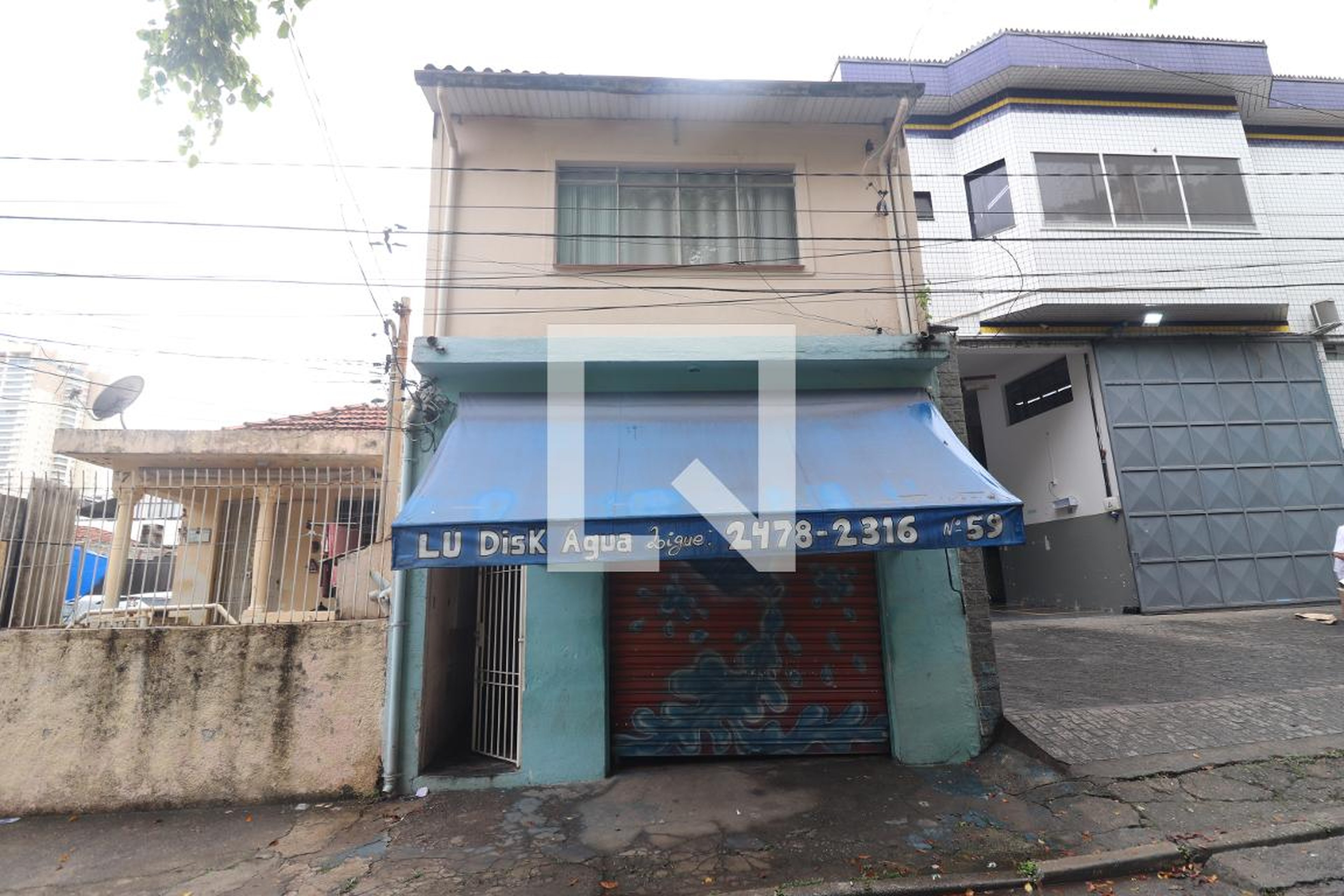 Fachada Condomínio em Rua Zodíaco, 59