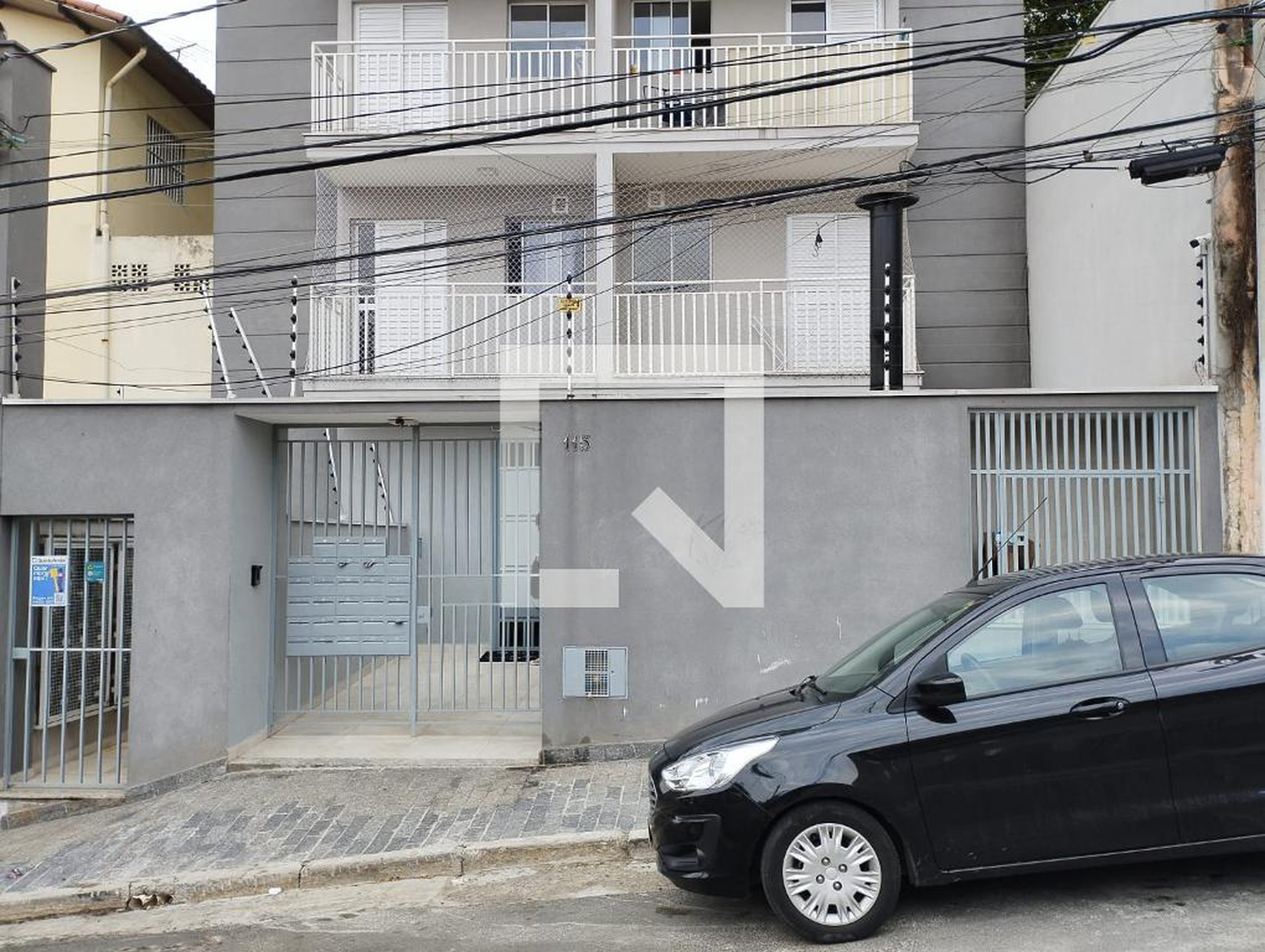 Fachada Condomínio em Rua Ponte Pensa, 115