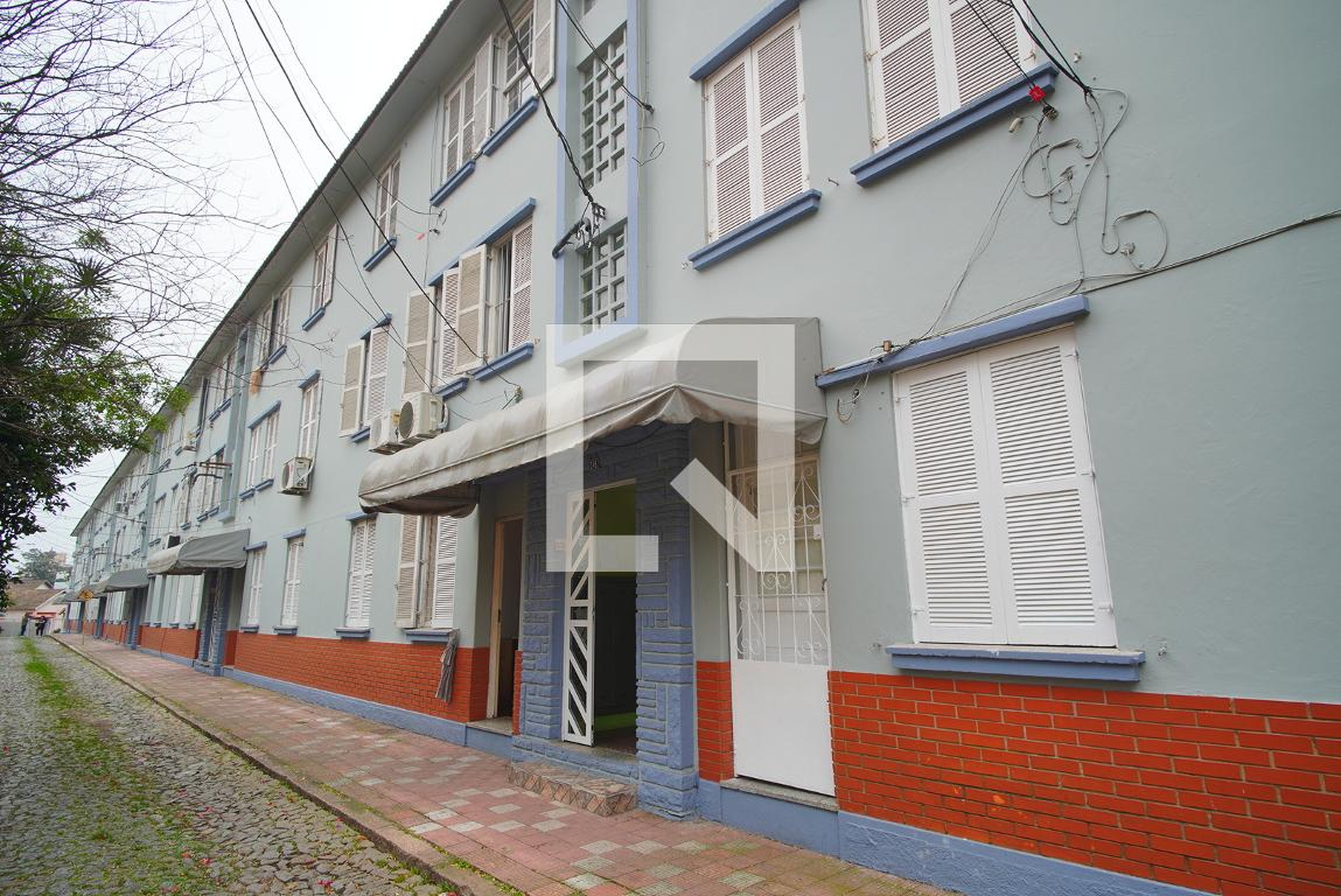 Fachada Condomínio em Rua Tuparaí, 248