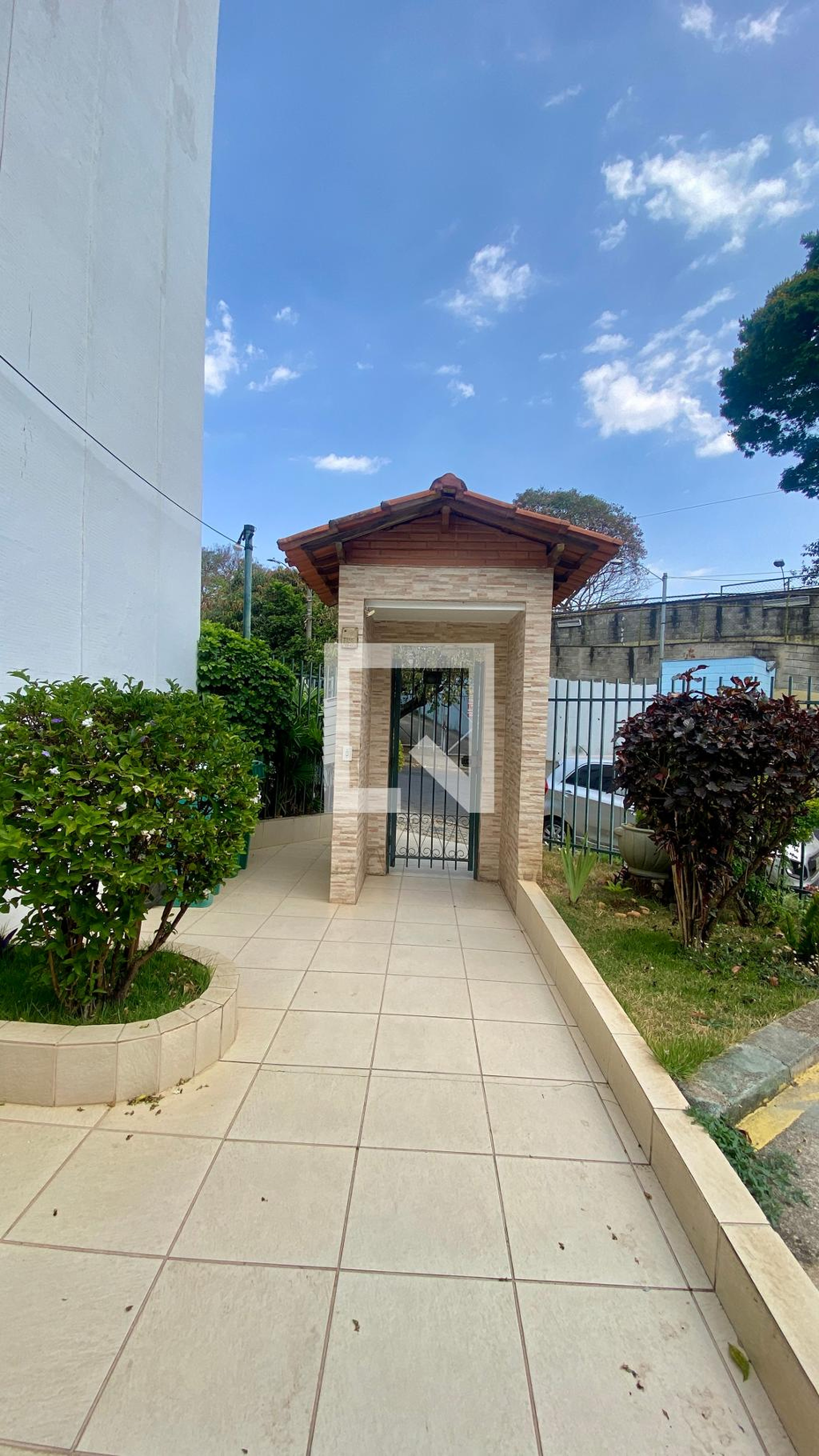 Hall de entrada Condomínio em Rua Camarugi, 55