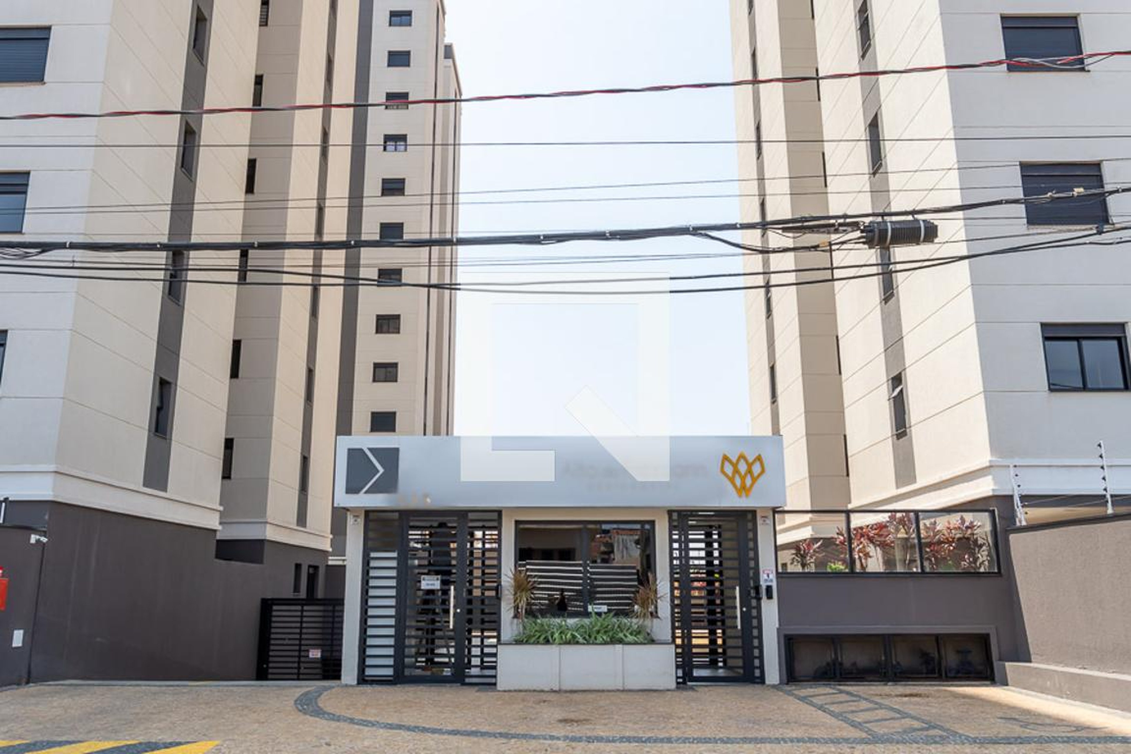 Fachada do Condomínio Condomínio Alto do Frezzarin