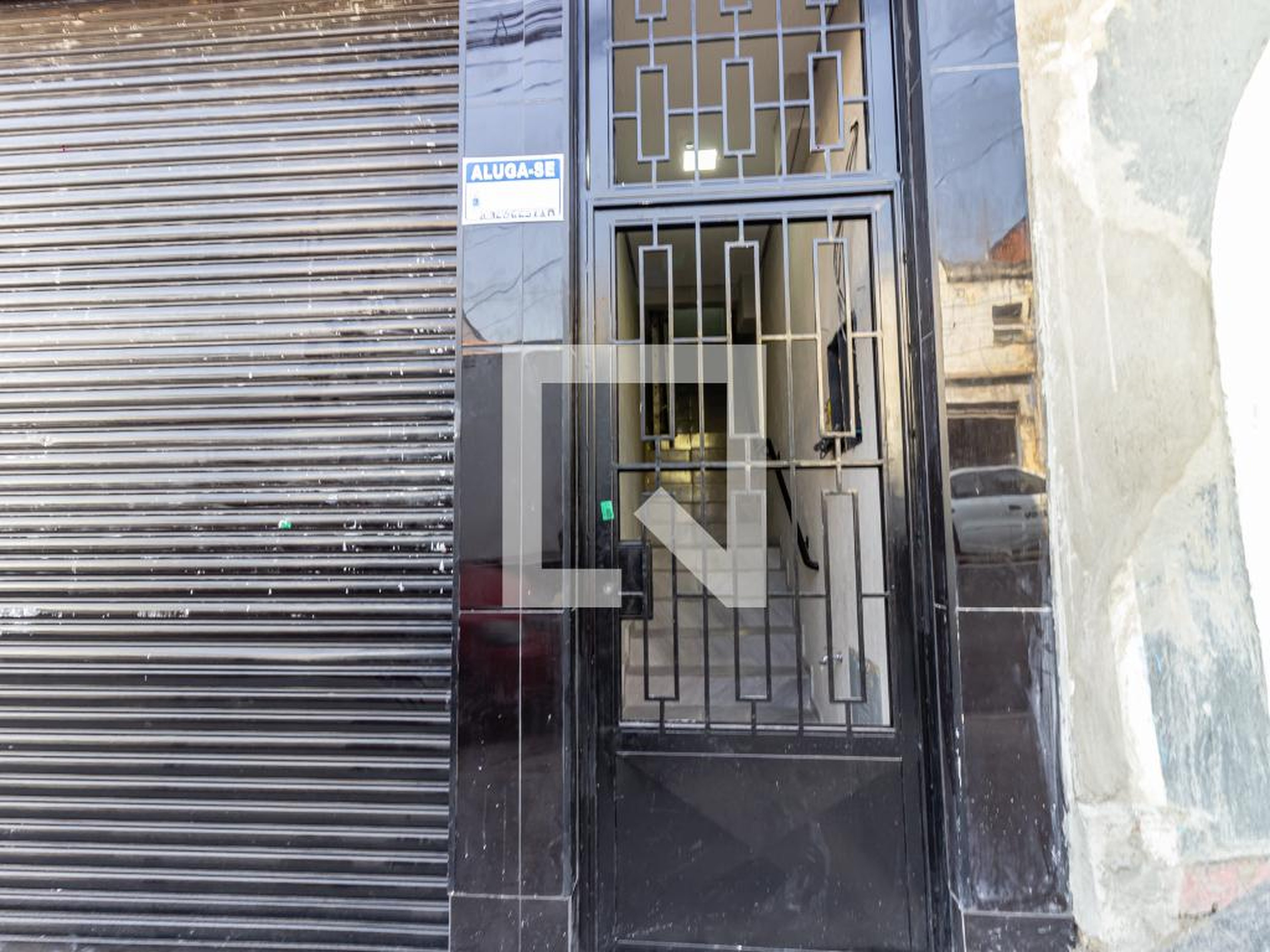 Fachada Condomínio em Rua Marcos Arruda, 64