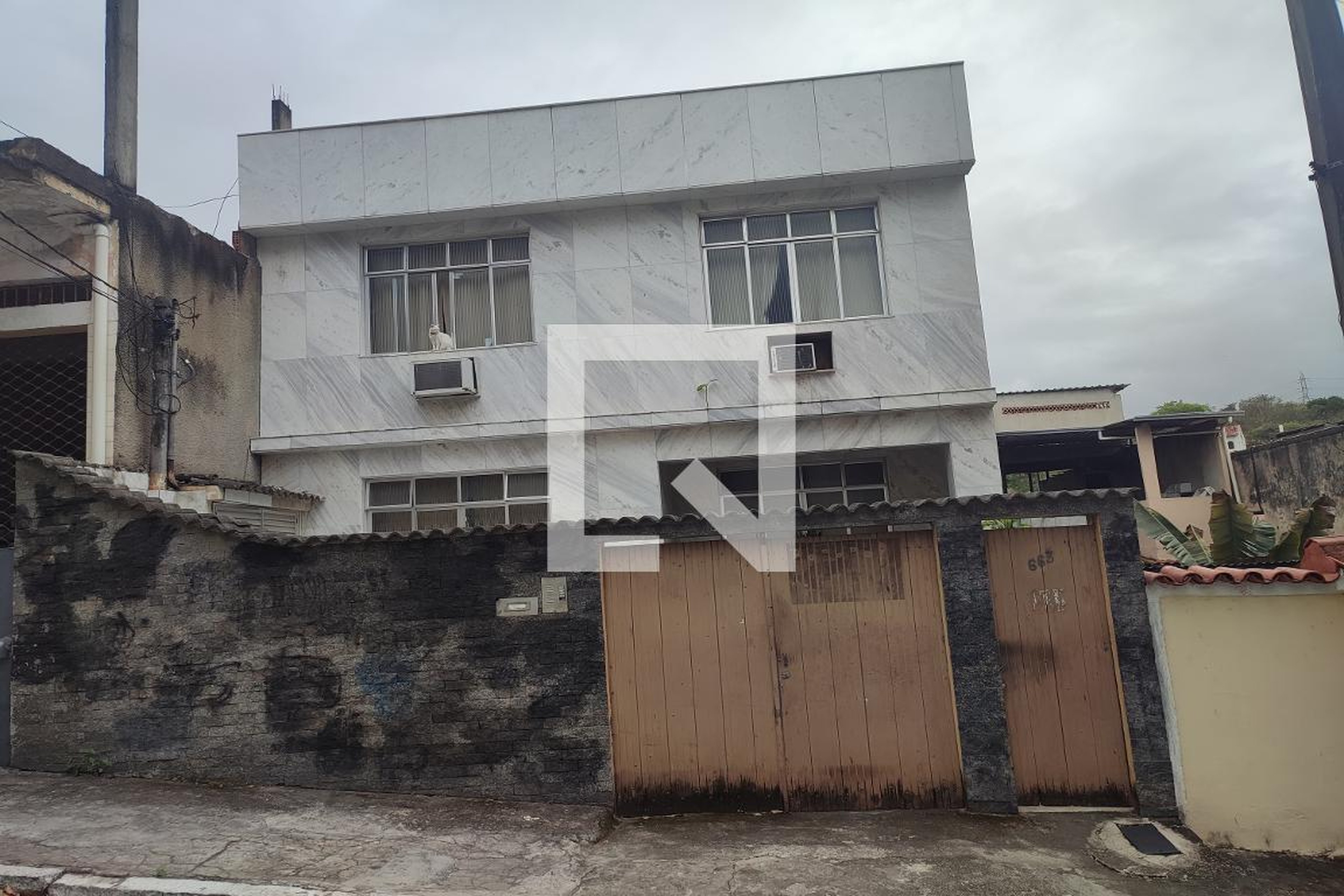 Fachada Condomínio em Rua Alberto Pasqualini, 663