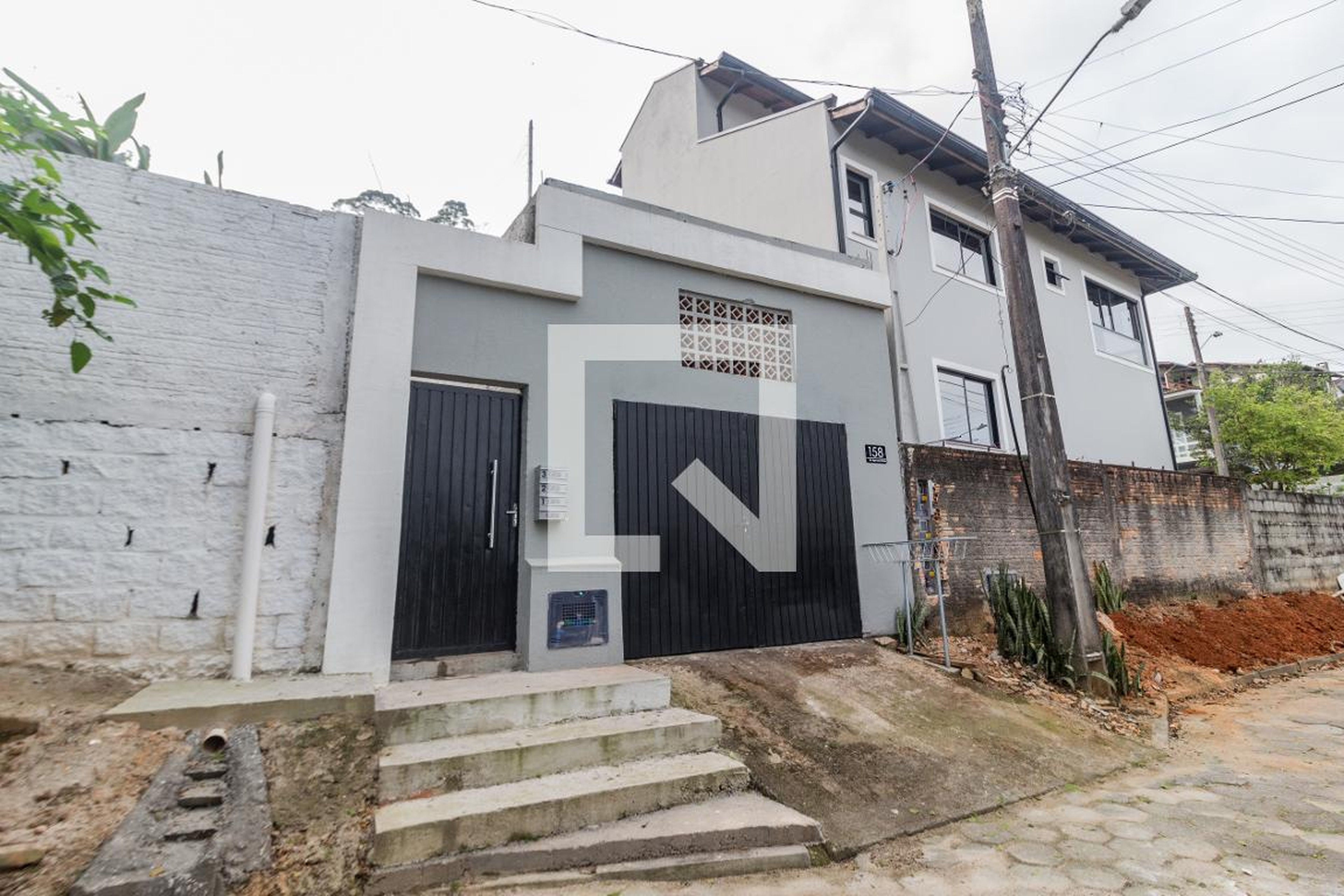 Fachada Condomínio em Servidão Miguel Arcanjo Machado, 158