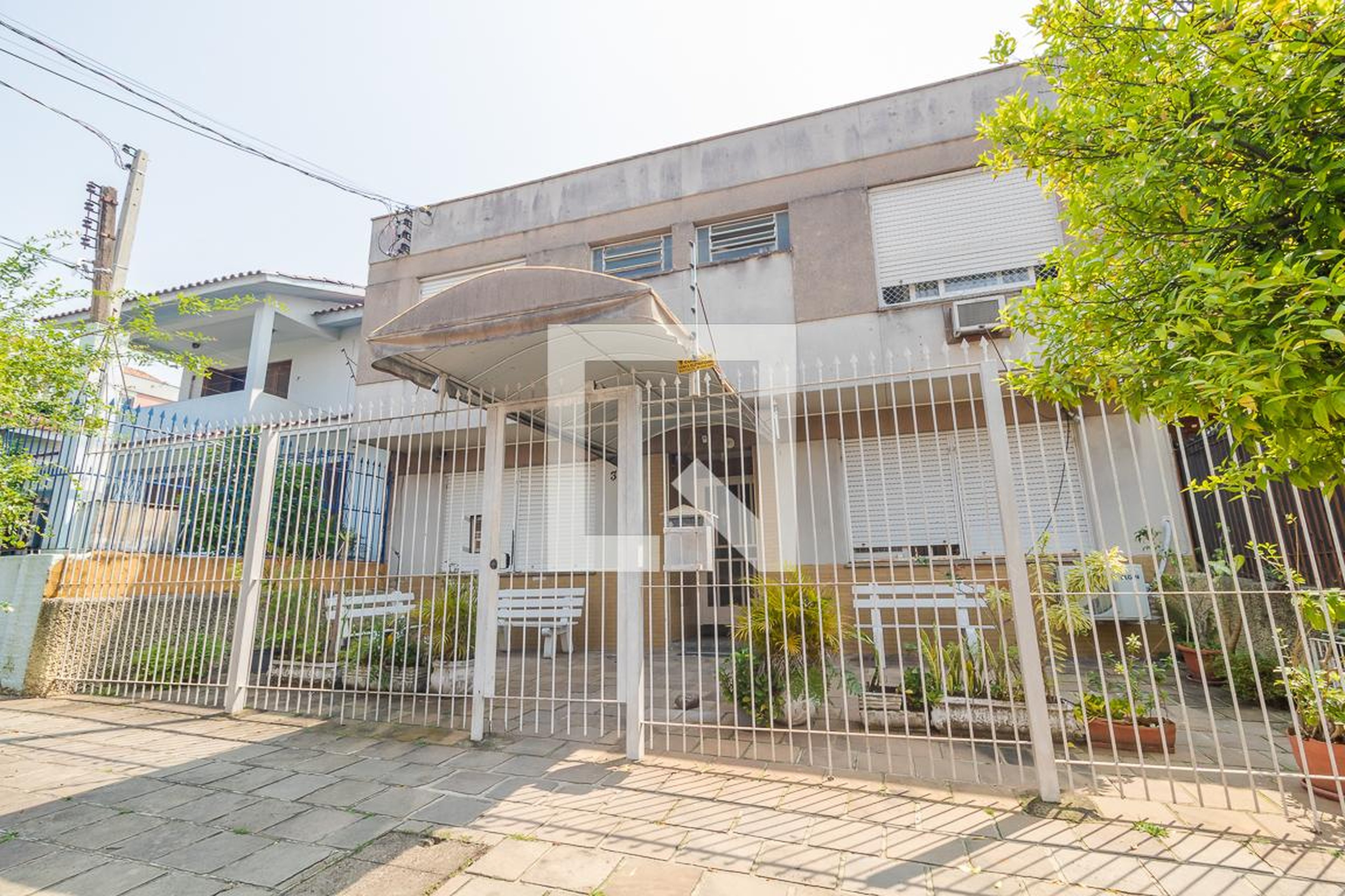 Fachada Condomínio em Rua Coronel Jaime da Costa Pereira, 330