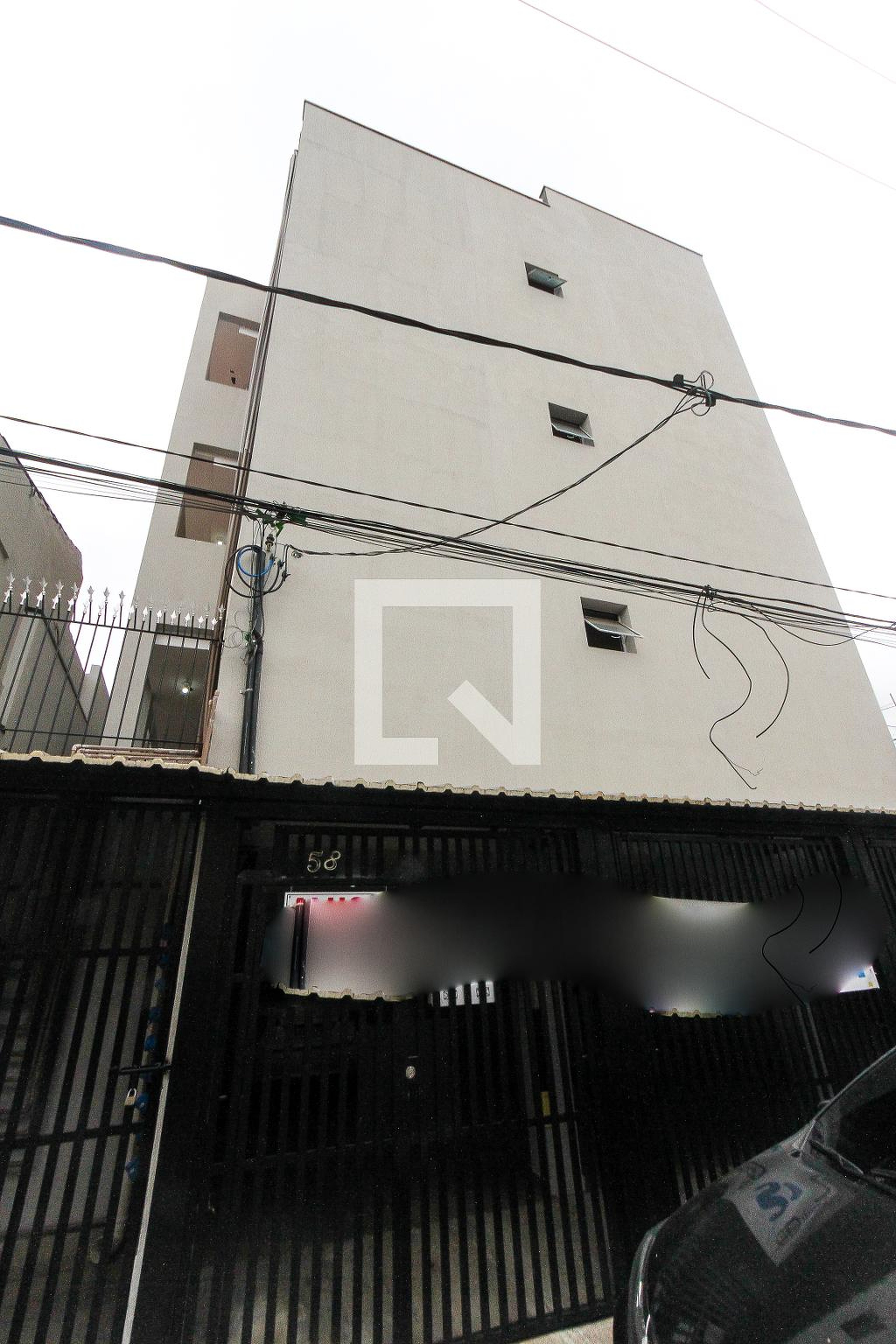 Fachada Condomínio em Rua Avelino Carvalho, 58