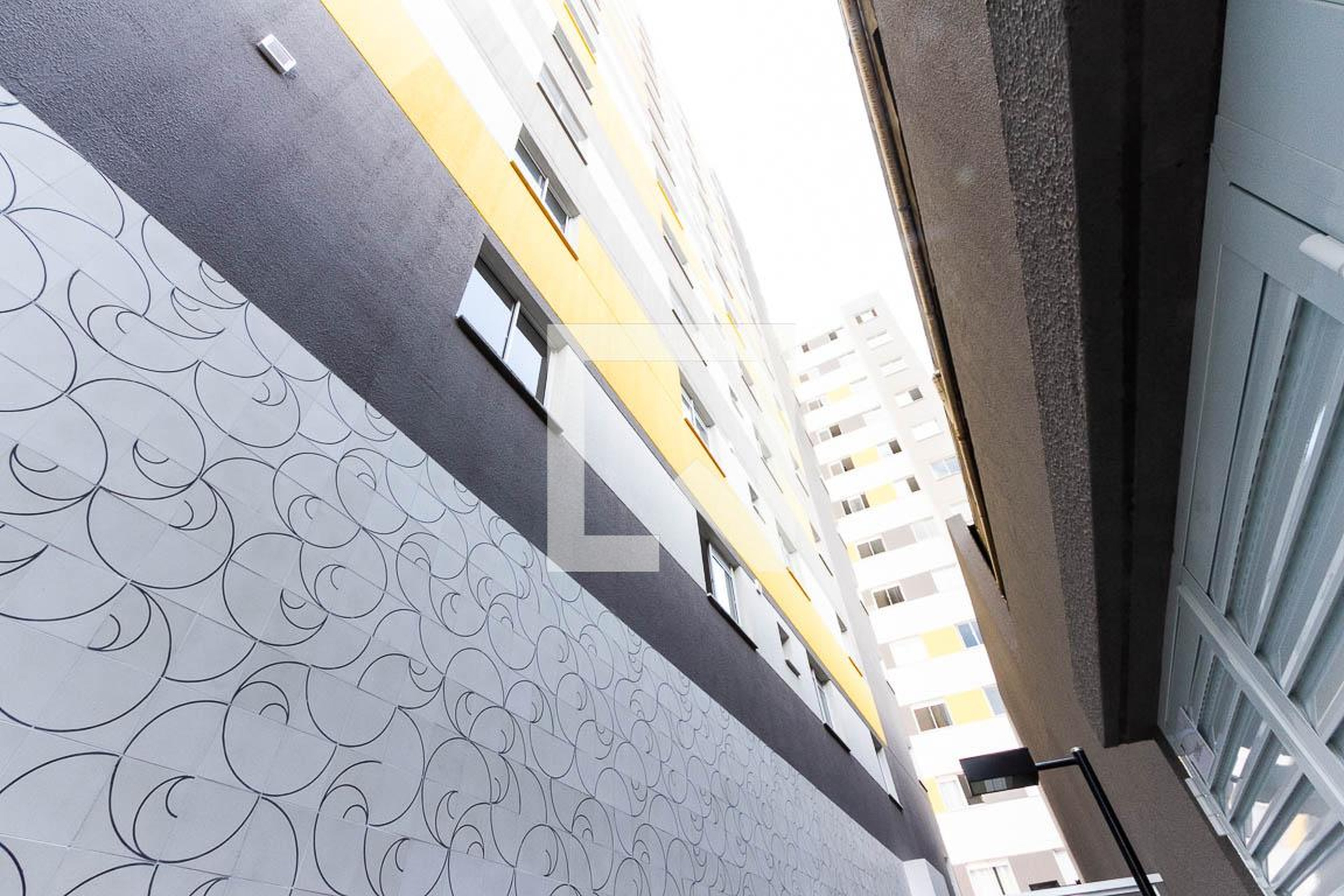 Fachada do Condomínio Condomínio Mundo Apto Pacaembu