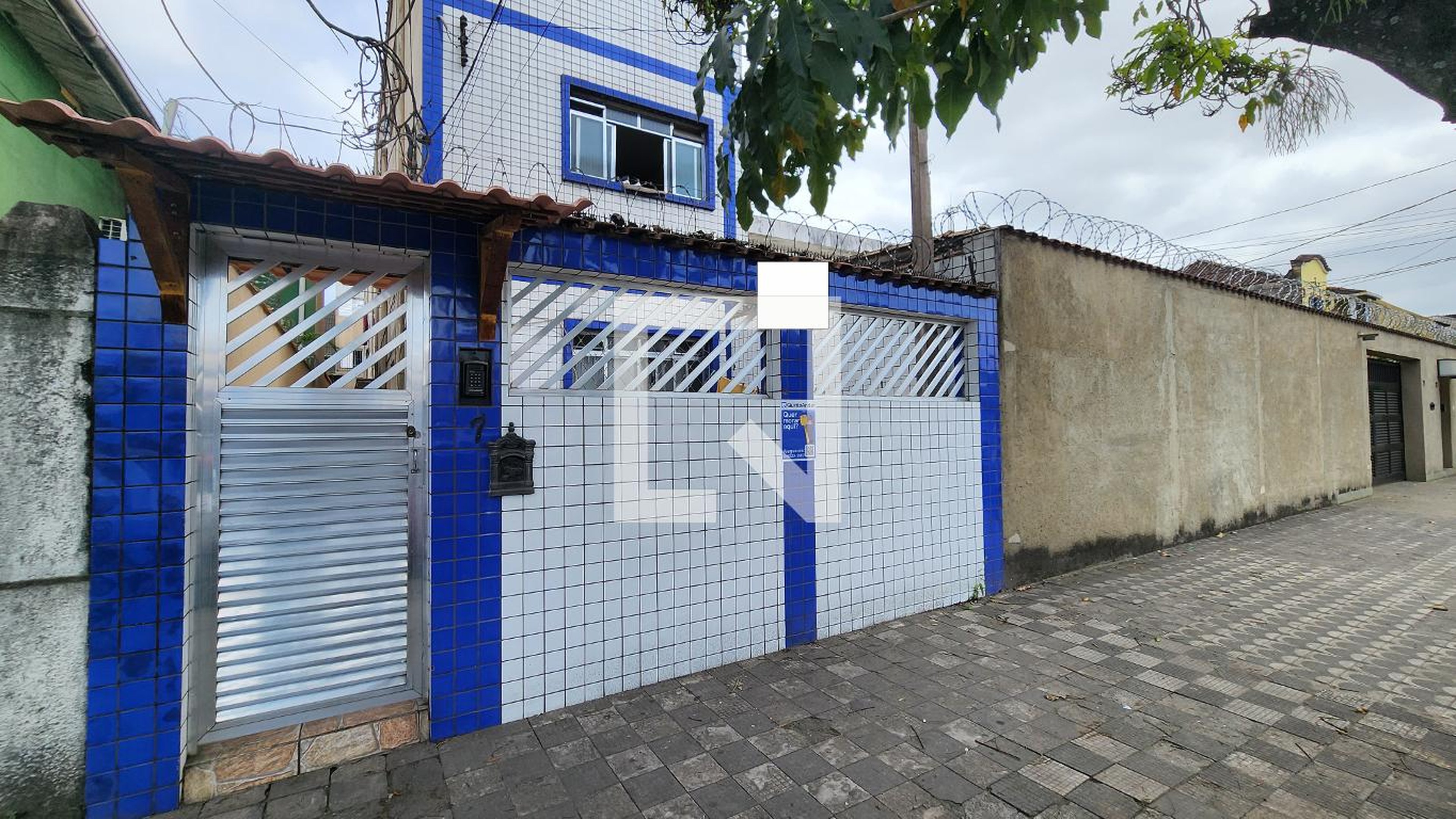 Fachada Condomínio em Rua Xavier Pinheiro, 67