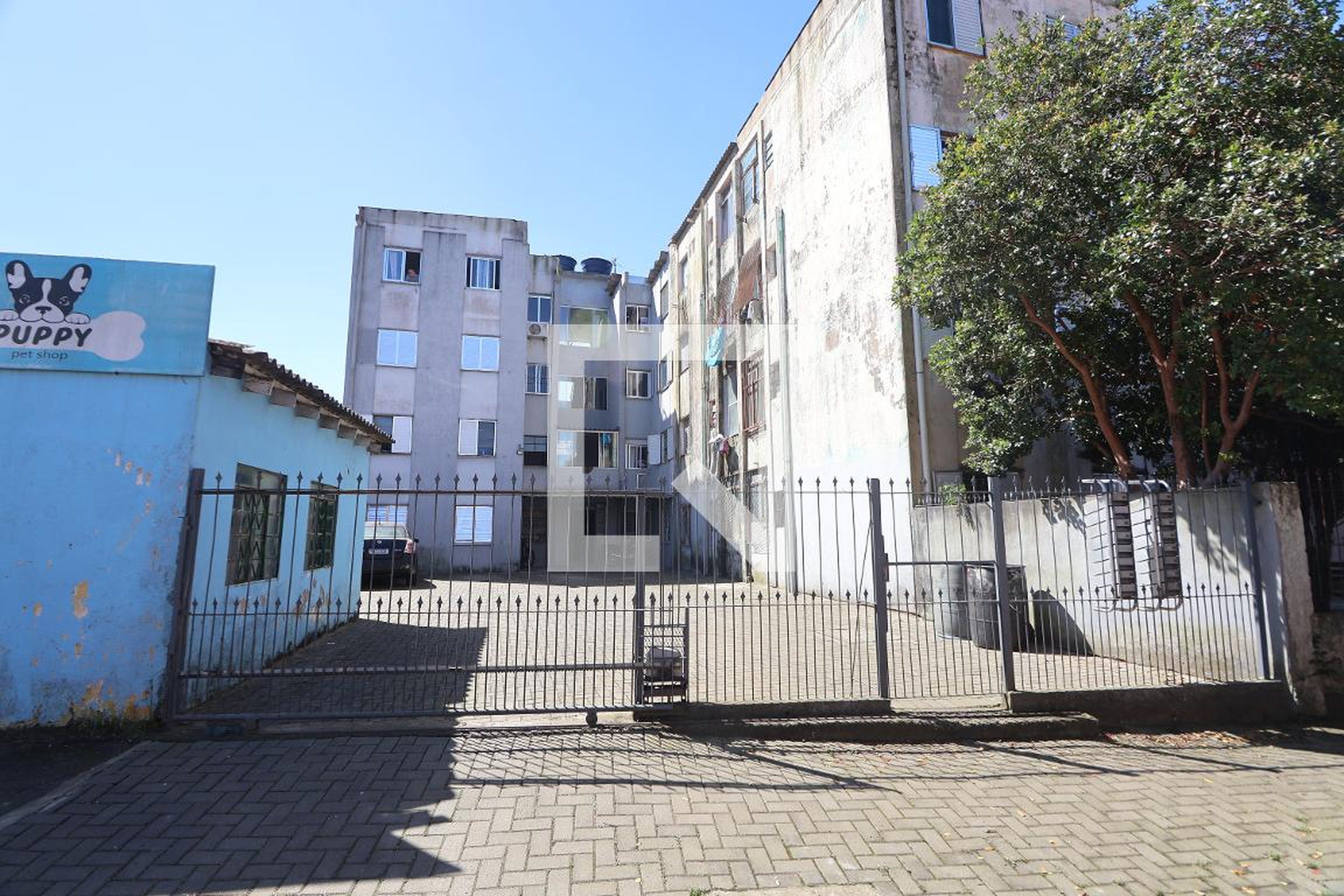 Fachada Condomínio em Rua 116a, 2