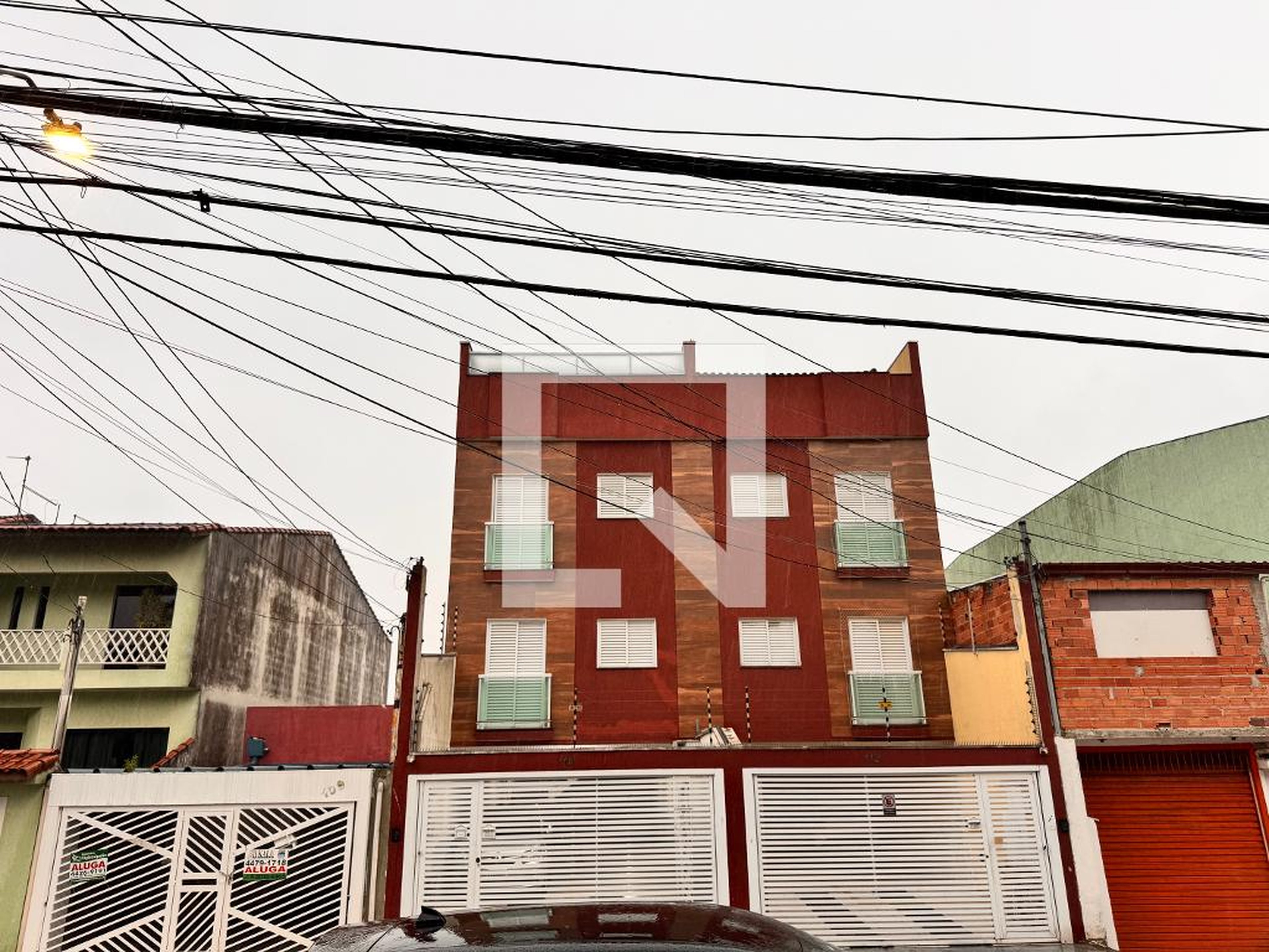 Fachada Condomínio em Rua Felipo Cataruzi, 115