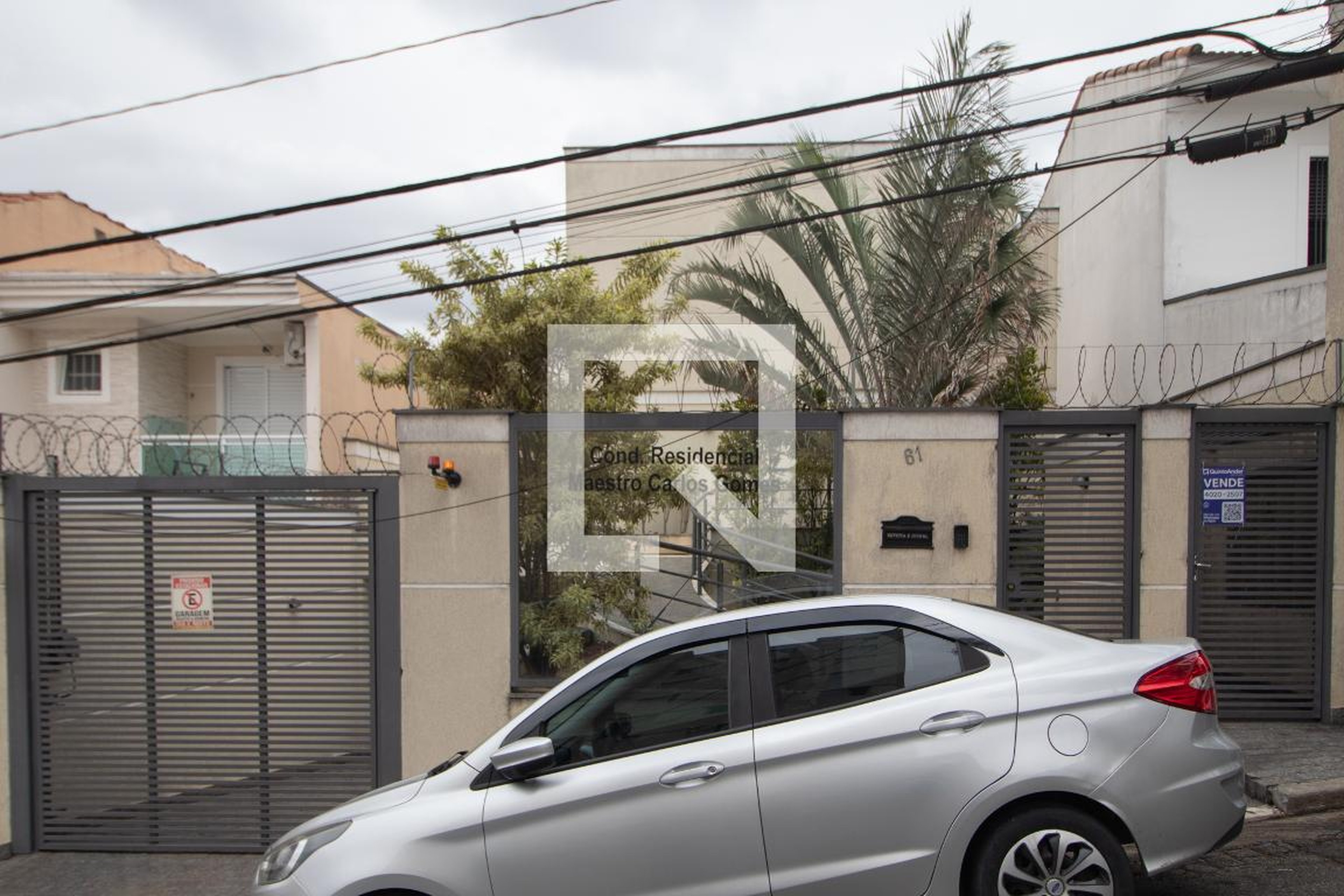 Fachada Condomínio em Rua Carlos Gomes, 61