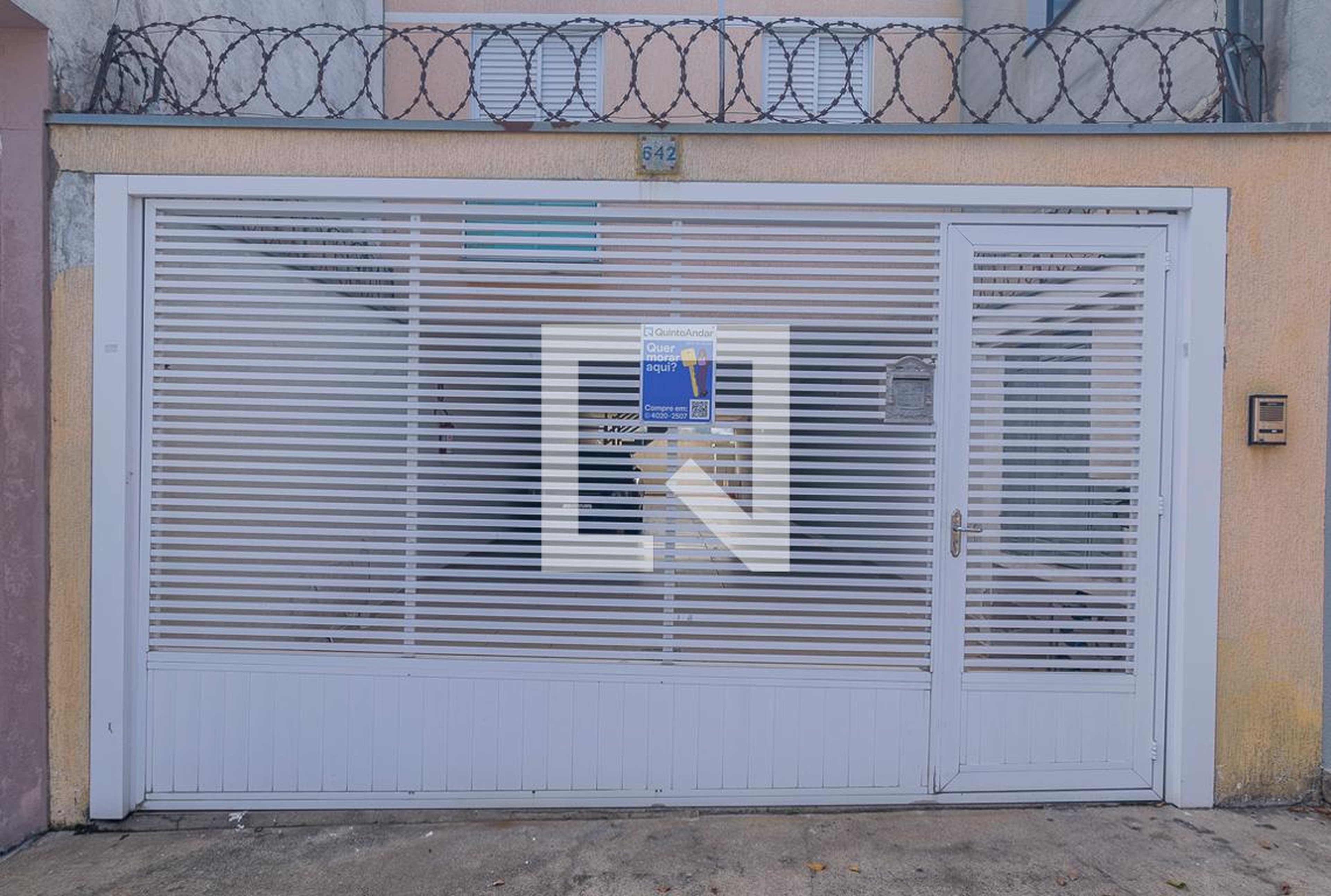 Fachada Condomínio em Rua Expedicionário Oscár Vano, 642