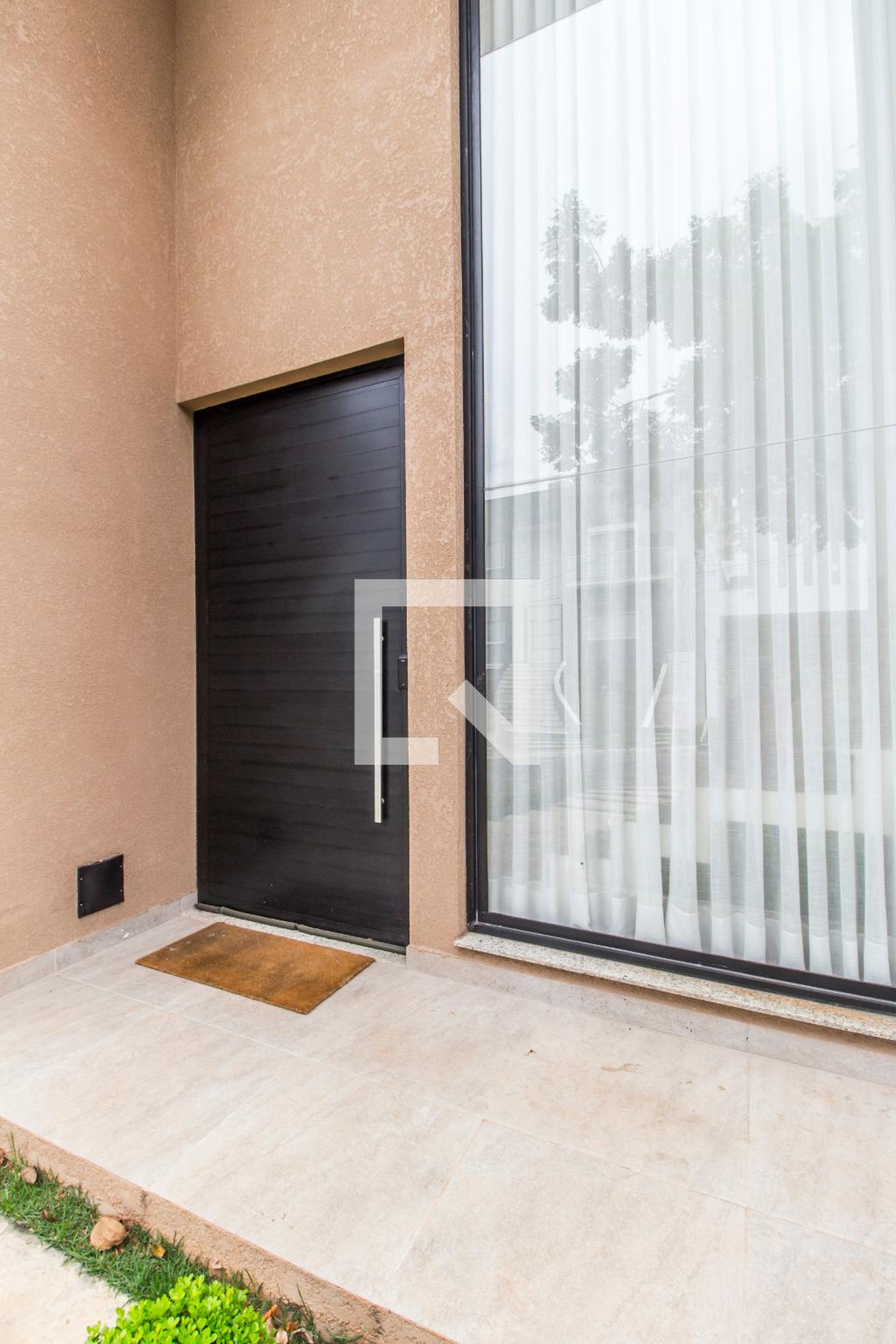 Entrada Condomínio em Rua Xavantes, 88