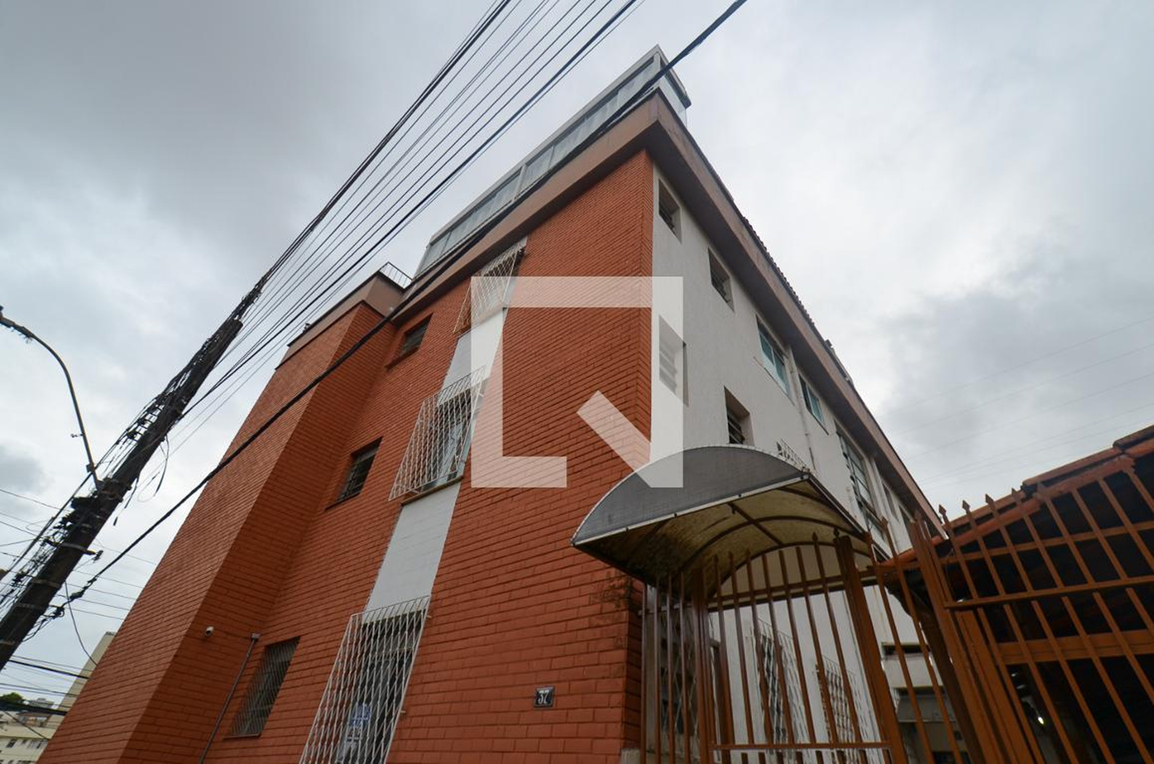 Fachada Condomínio em Rua Coronel Júlio Pinto, 37