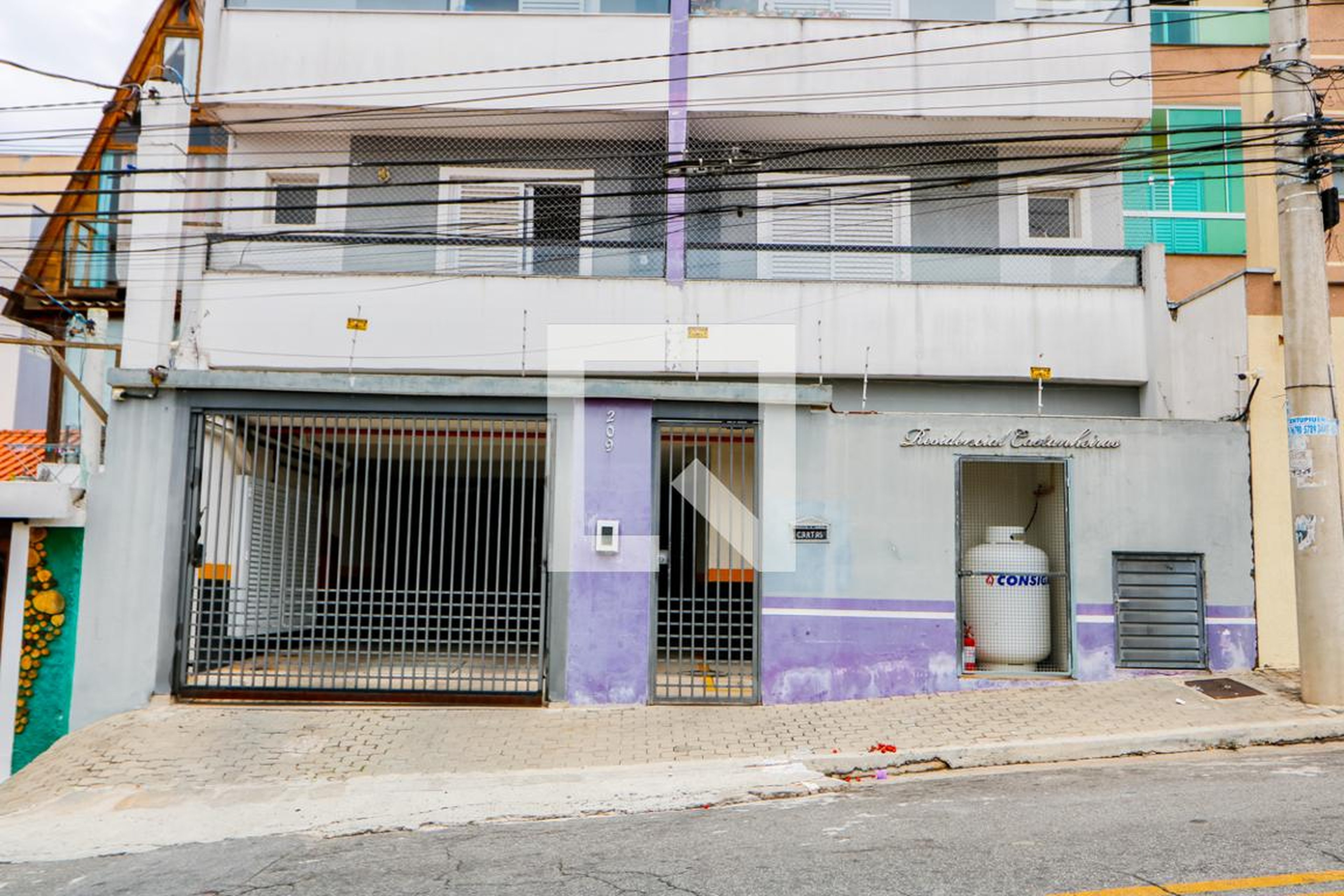 Fachada Condomínio em Rua Eliza Cogheto, 209