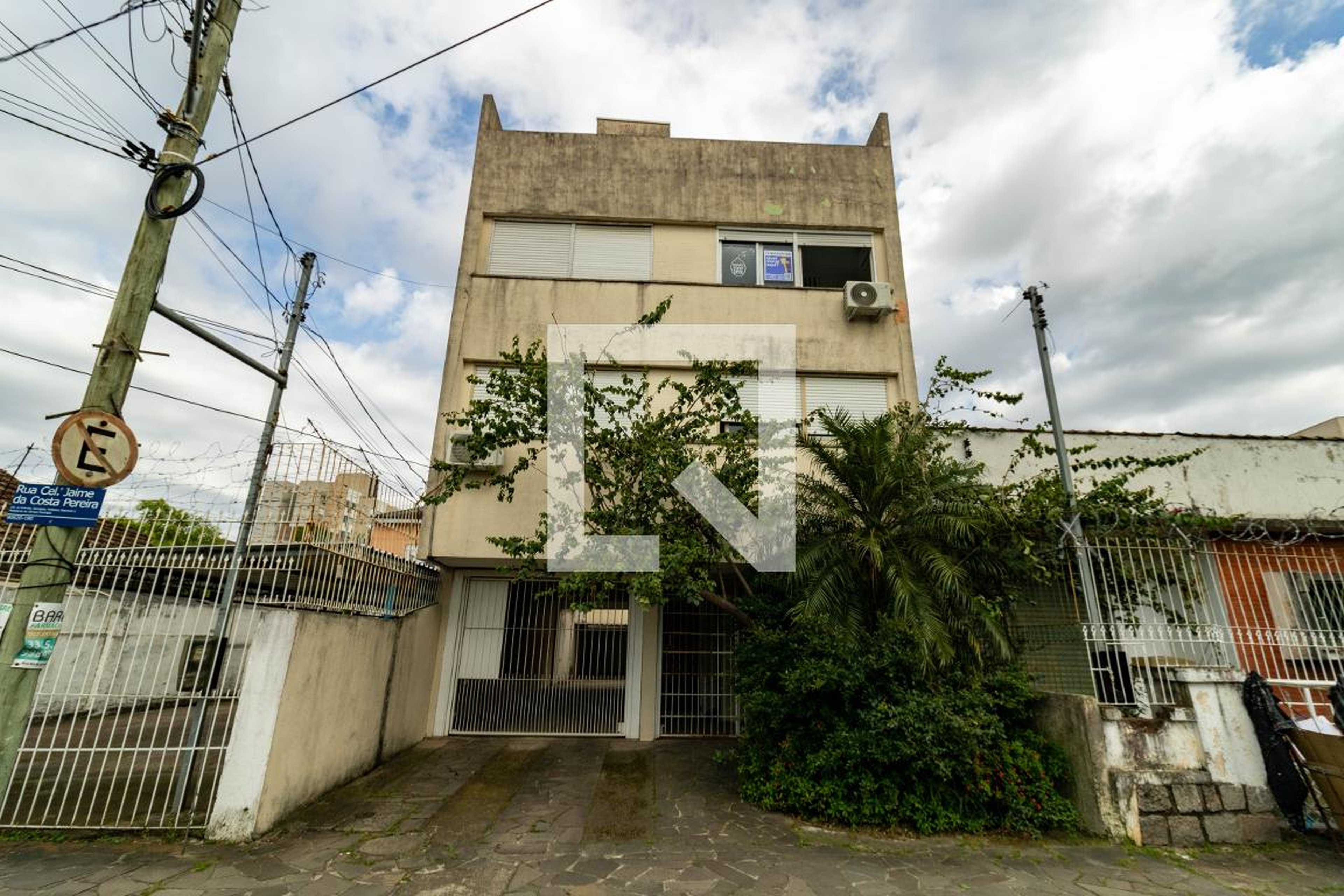 Fachada Condomínio em Rua Coronel Jaime da Costa Pereira, 410