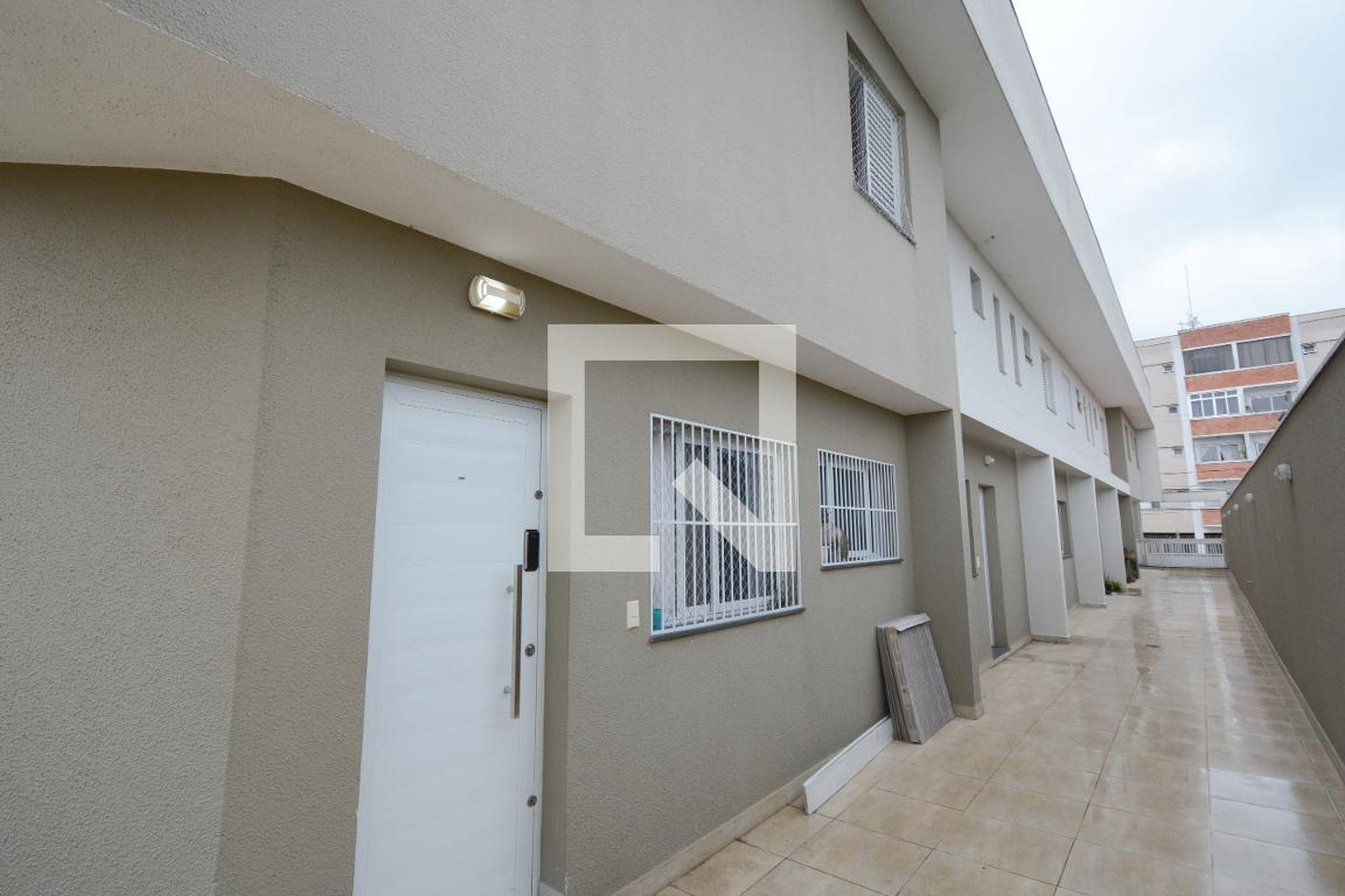 Fachada Condomínio em Rua Gregório Ferreira, 85