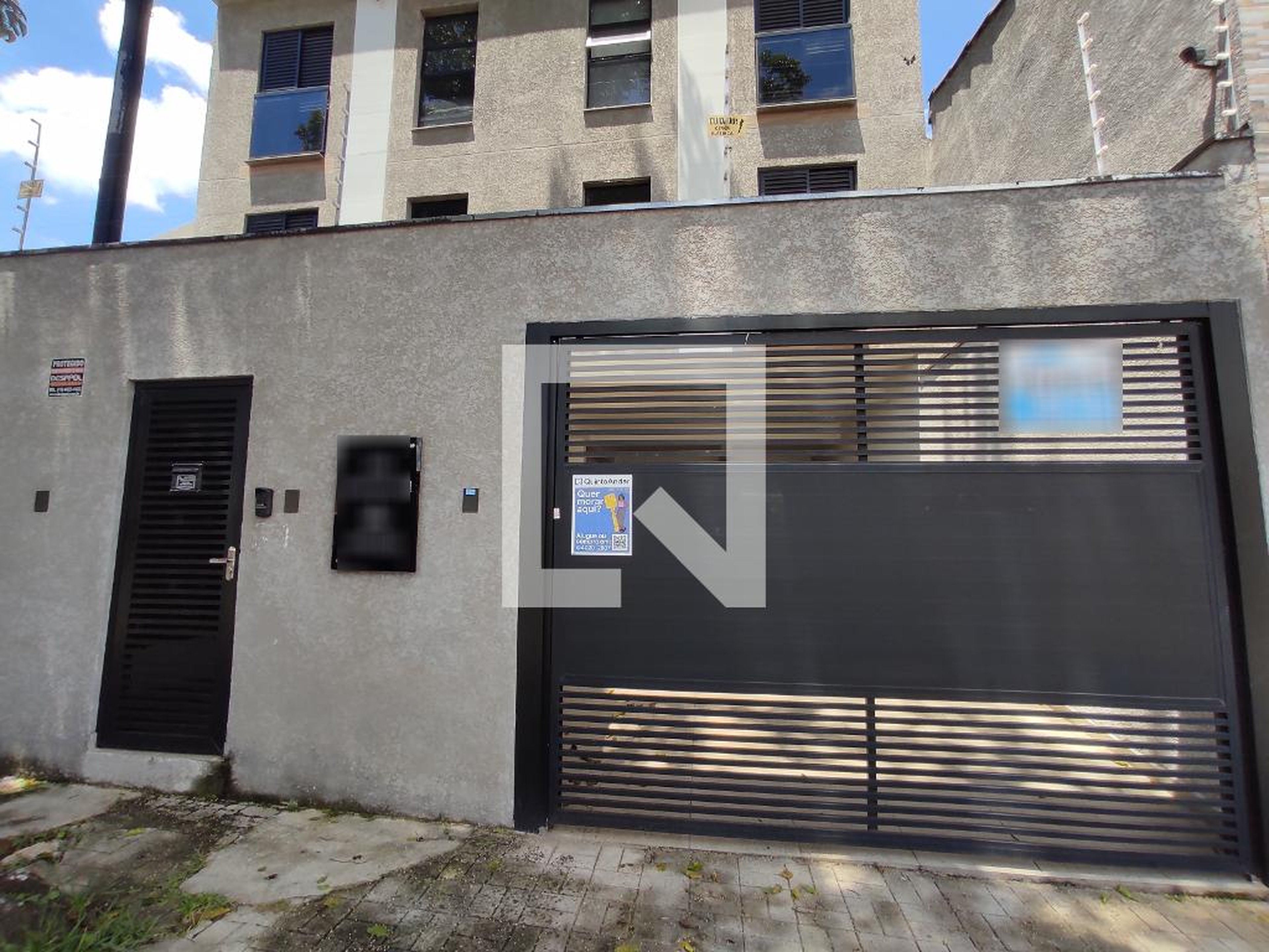 Fachada Condomínio em Rua Guimarães Passos, 194