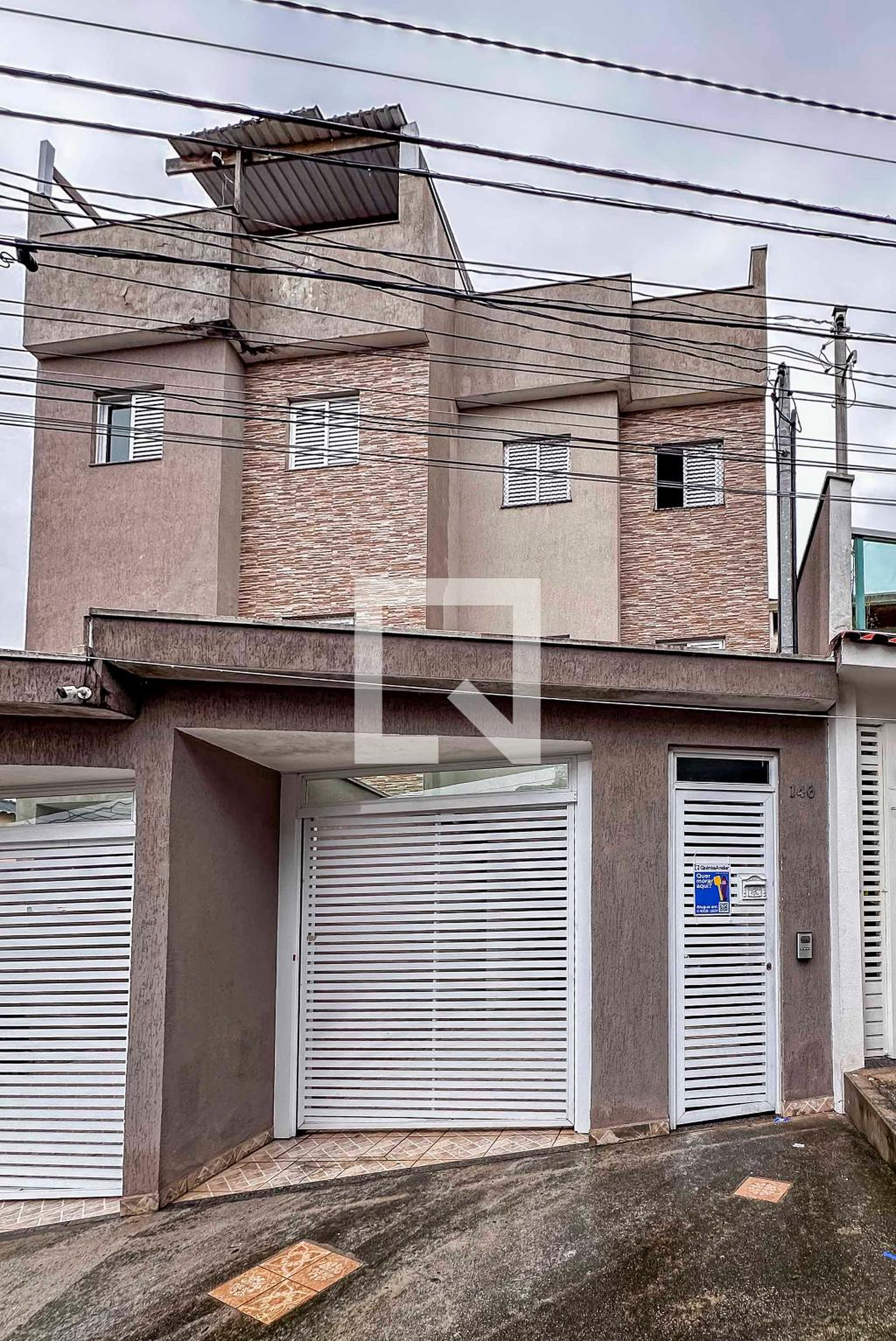 Fachada Condomínio em Rua Guapira, 146