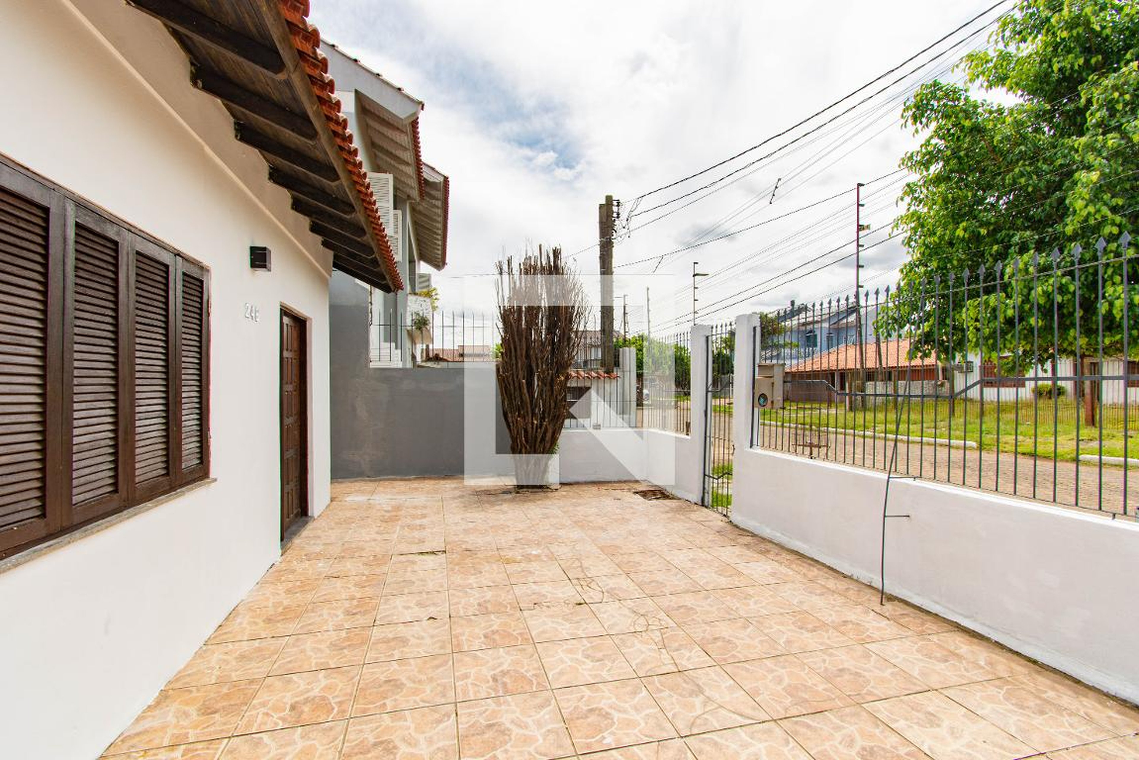 Fachada Condomínio em Rua das Begônias, 24