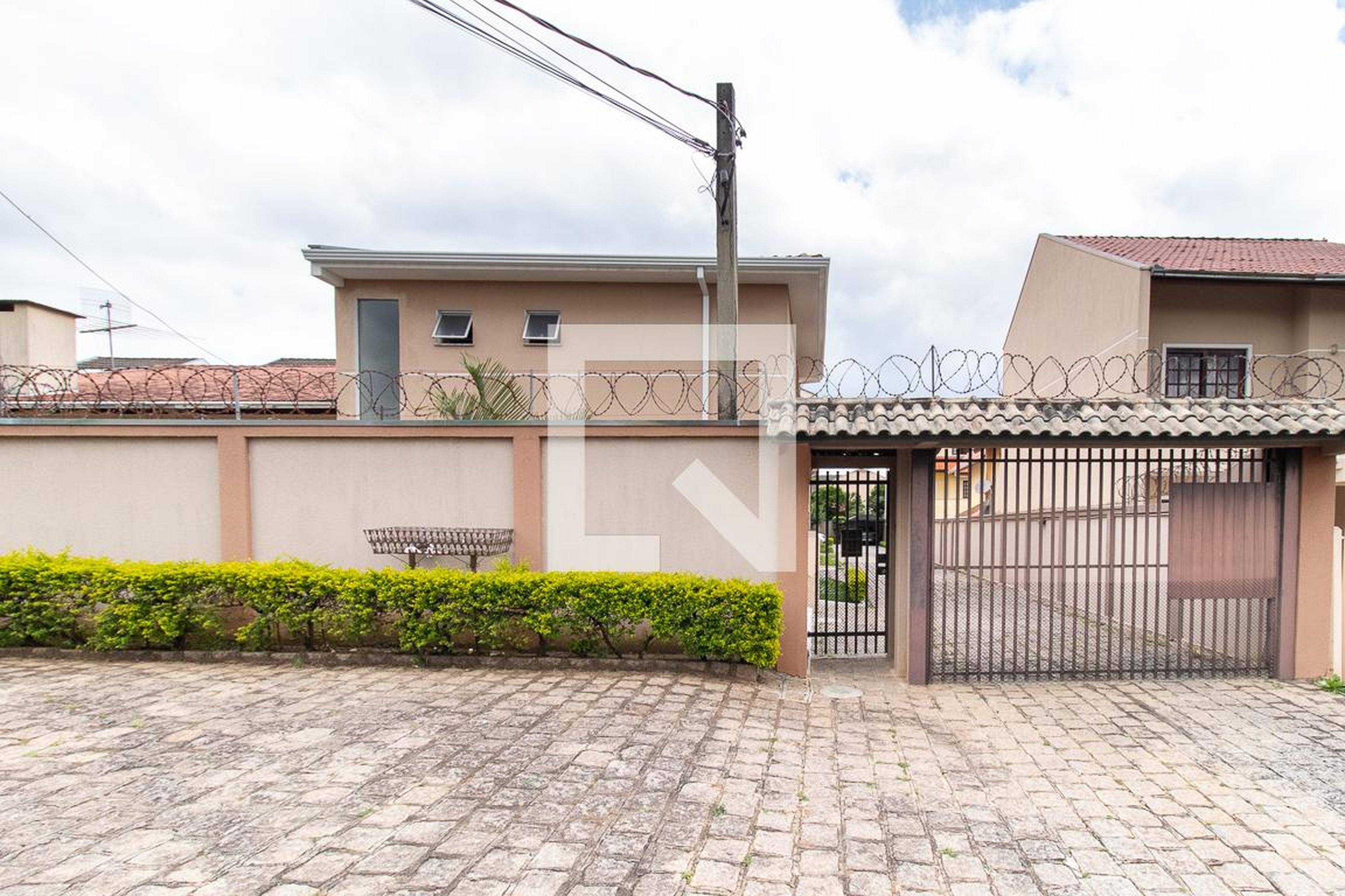 Fachada Condomínio em Rua Angelina Braga Cortezzi, 315
