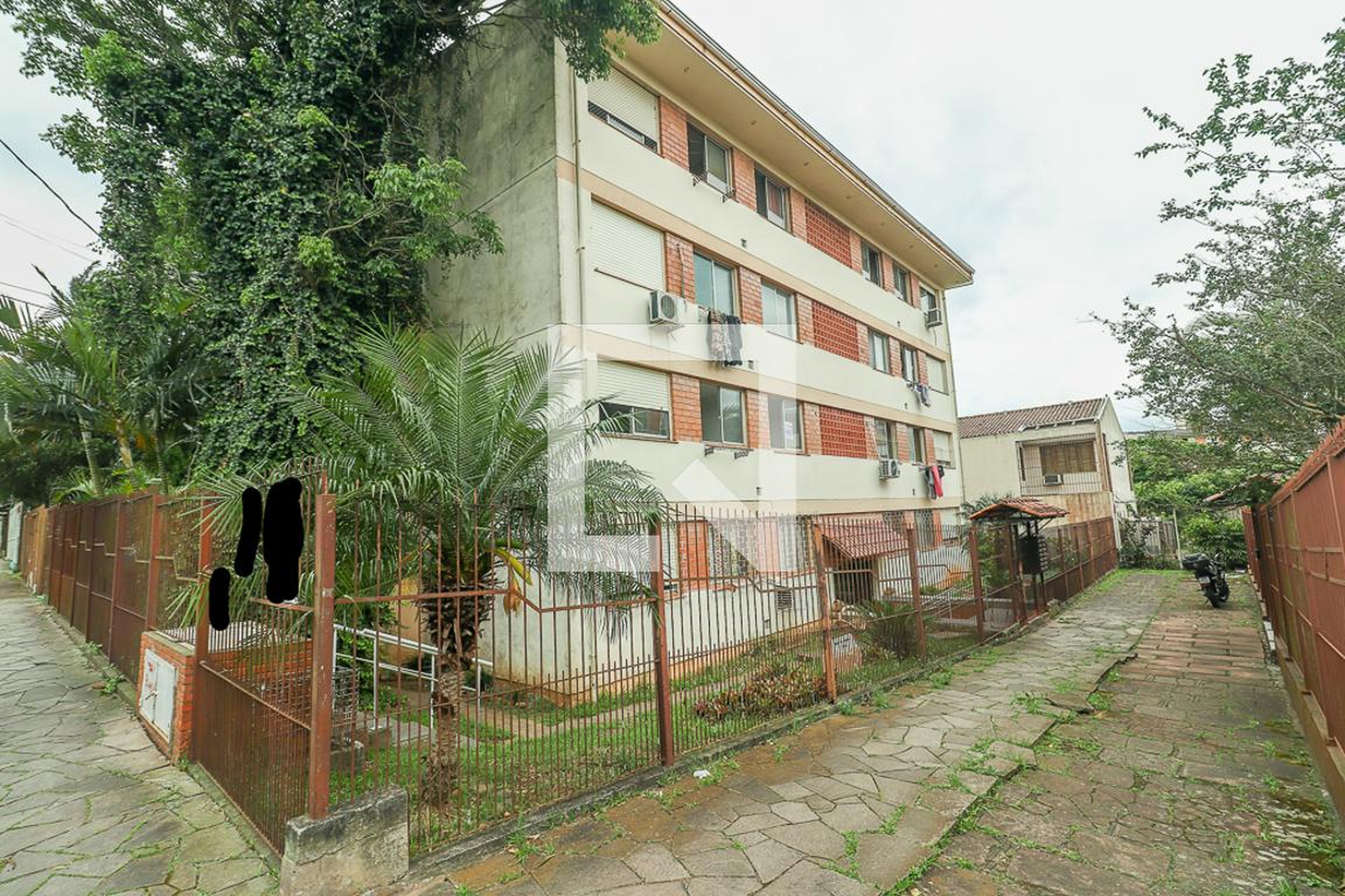 Fachada Condomínio em Rua Aloisio Olympio De Mello, 170